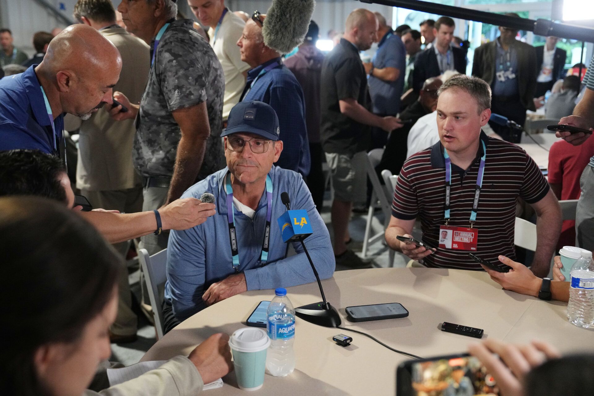 Mar 31, 2025; Palm Beach, FL, USA; Los Angeles Chargers head coach Jim Harbaugh answers questions during the NFL Annual League Meeting at The Breakers. Mandatory Credit: Jim Rassol-Imagn Images