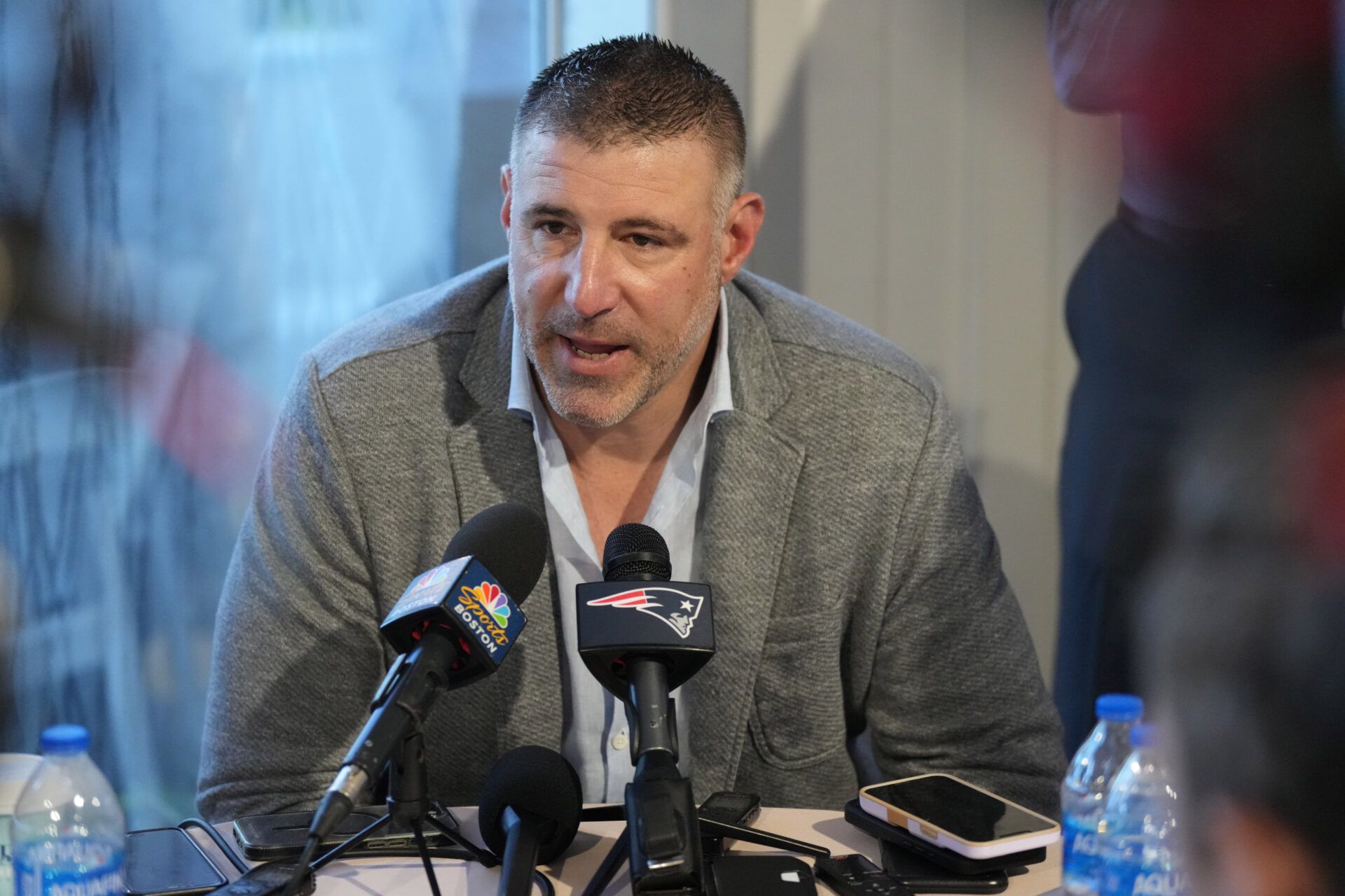 Mar 31, 2025; Palm Beach, FL, USA; New England Patriots head coach Mike Vrabel answers questions from the media during the NFL Annual League Meeting at The Breakers. Mandatory Credit: Jim Rassol-Imagn Images