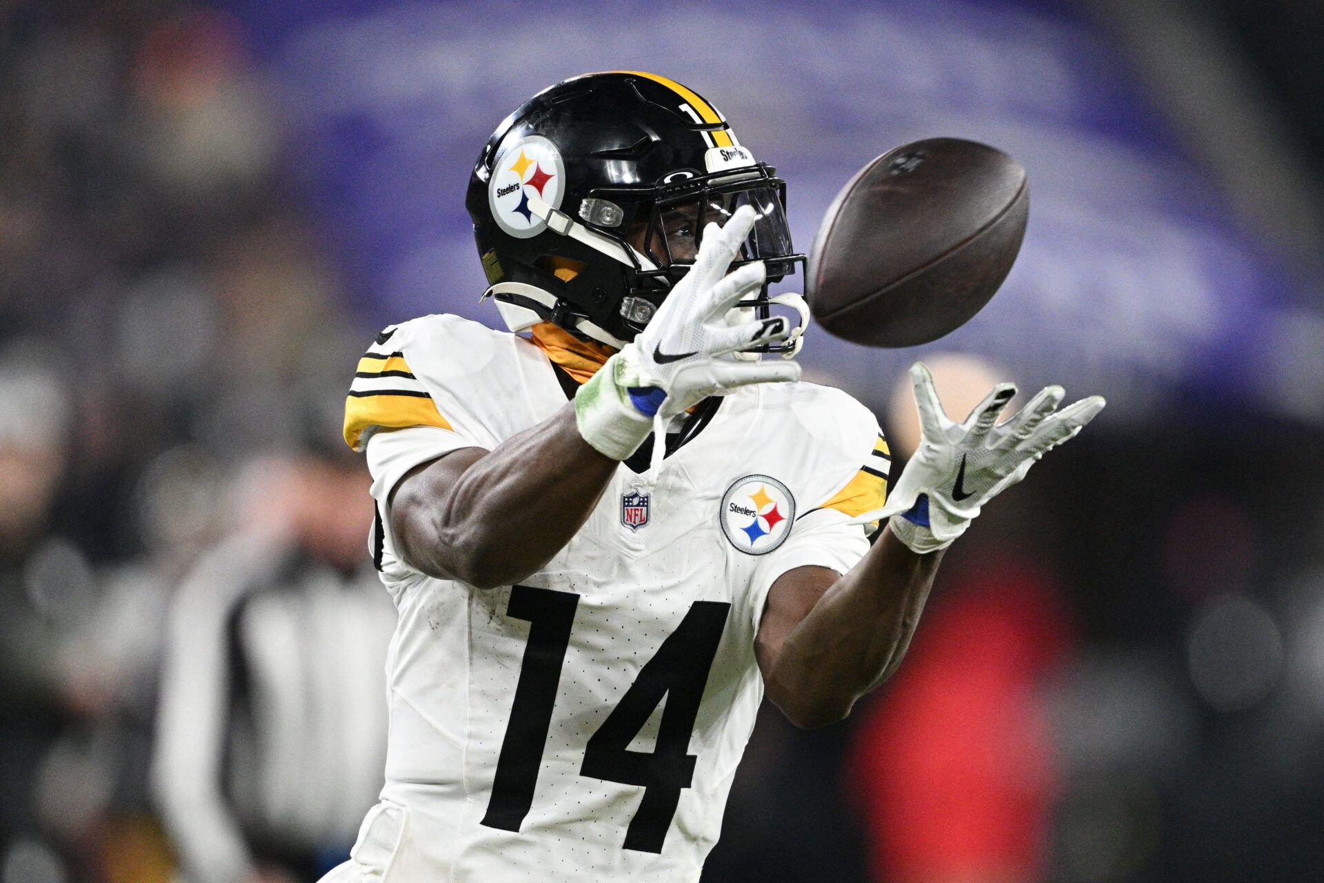 Pittsburgh Steelers wide receiver George Pickens (14) makes a catch against the Baltimore Ravens in the third quarter in an AFC wild card game at M&T Bank Stadium.