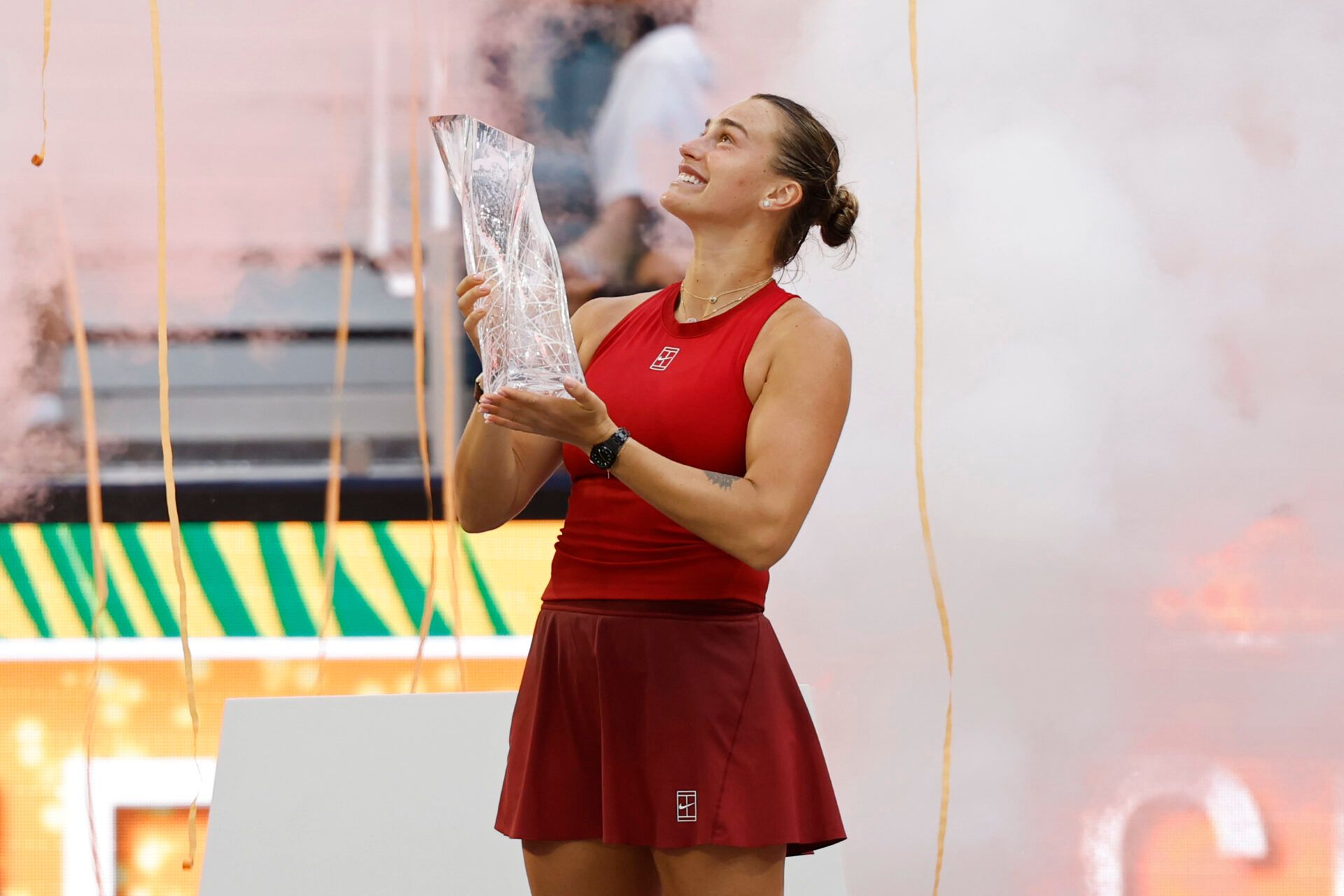 Mar 29, 2025; Miami, FL, USA; Aryna Sabalenka celebrates with the Butch Buchholz trophy after her match against Jessica Pegula (USA)(not pictured) in the women's singles championship of the Miami Open at Hard Rock Stadium. Mandatory Credit: Geoff Burke-Imagn Images