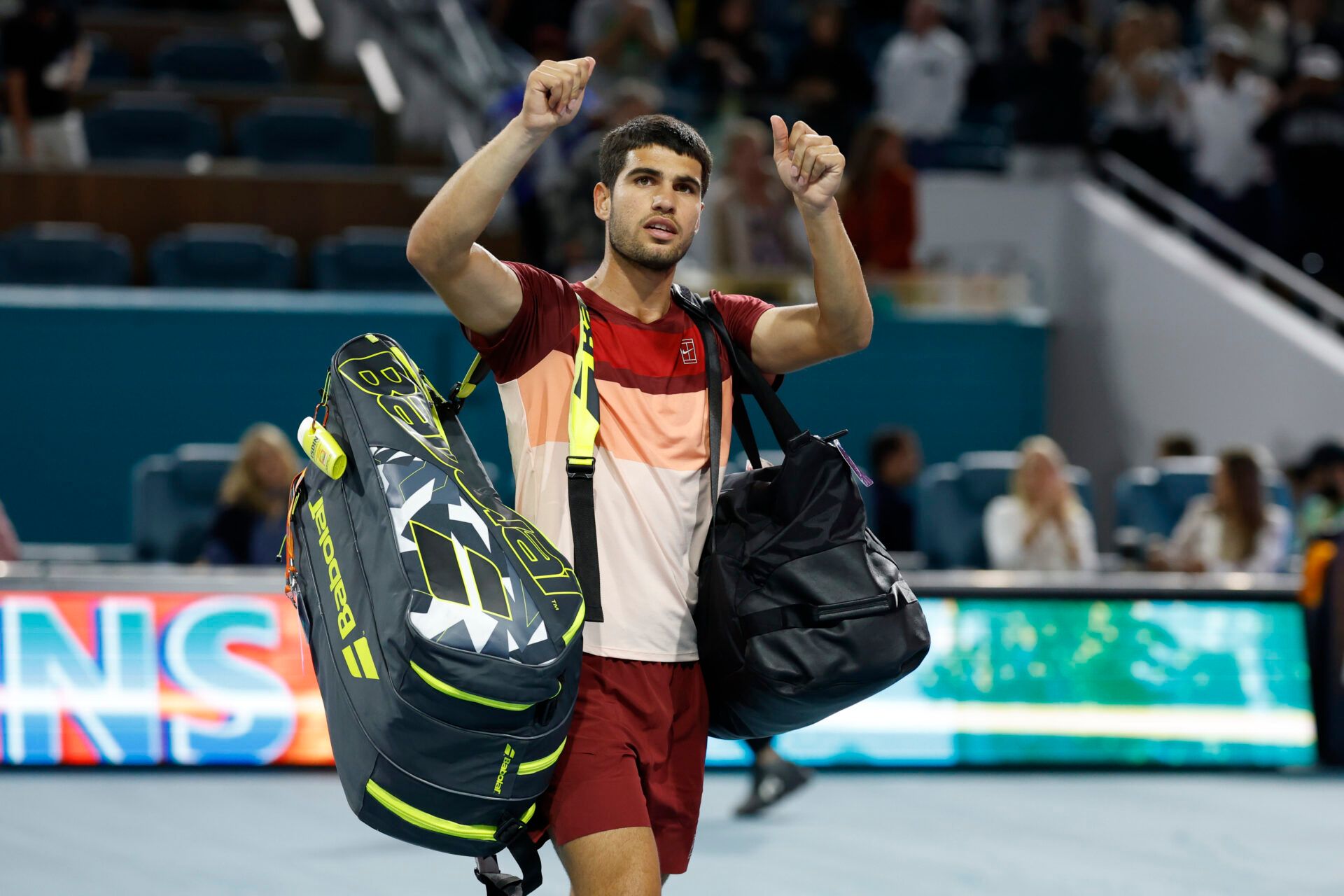 Mar 21, 2025; Miami, FL, USA; Carlos Alcaraz (ESP) acknowledges the fans while leaving the court after his match against David Goffin (BEL)(not pictured) on day four of the Miami Open at Hard Rock Stadium. Mandatory Credit: Geoff Burke-Imagn Images