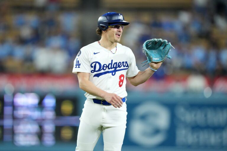 Los Angeles Dodgers first baseman Kike Hernandez (8) pitches in the ninth inning against the Miami Marlins at Dodger Stadium.