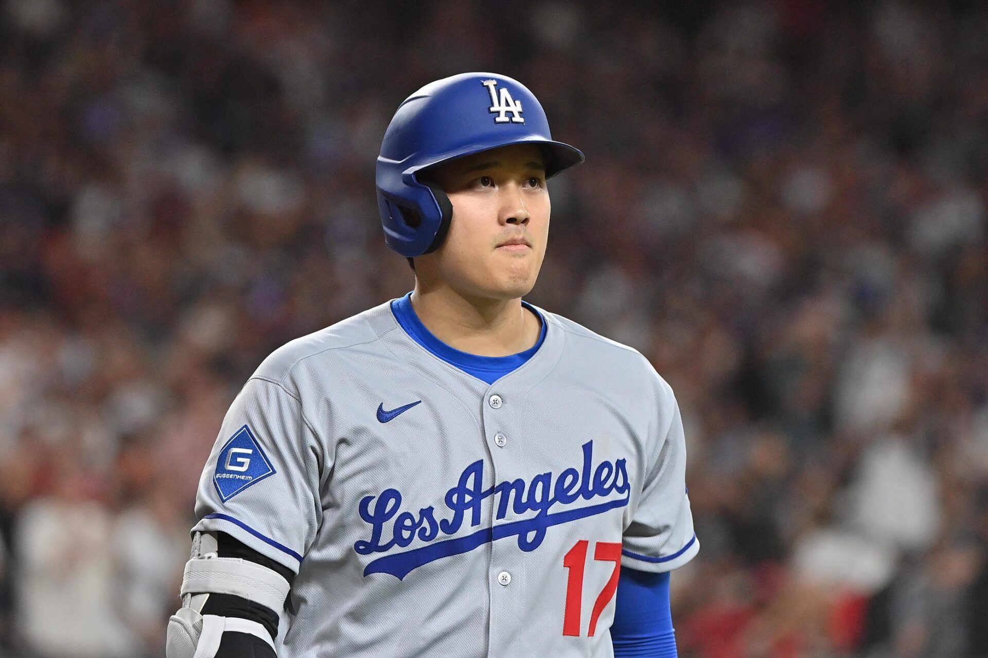 Los Angeles Dodgers two-way player Shohei Ohtani (17) reacts after striking out in the seventh inning against the Arizona Diamondbacks at Chase Field.