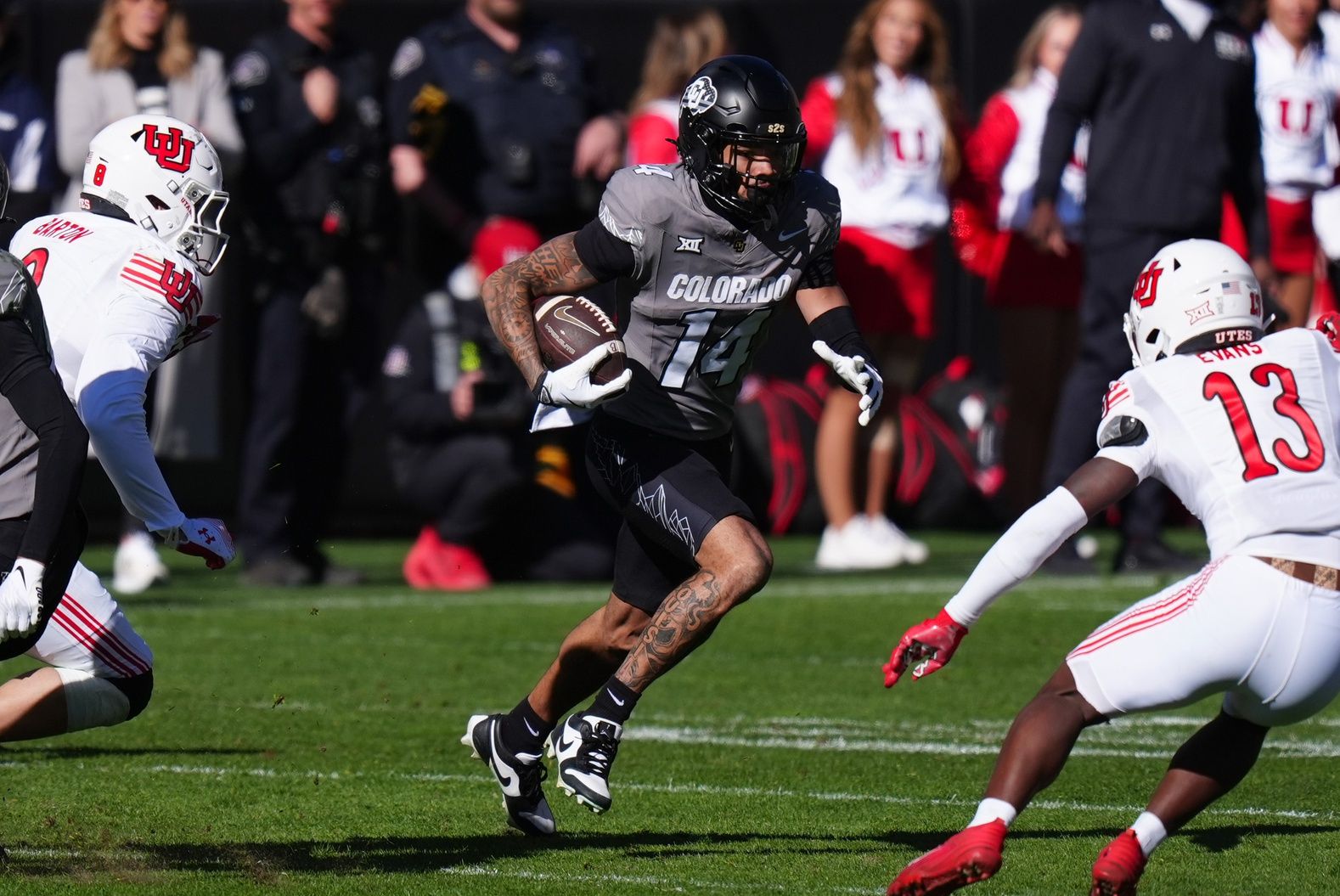Colorado Buffaloes wide receiver Will Sheppard (14) carries the ball in the second quarter against the Utah Utes at Folsom Field.