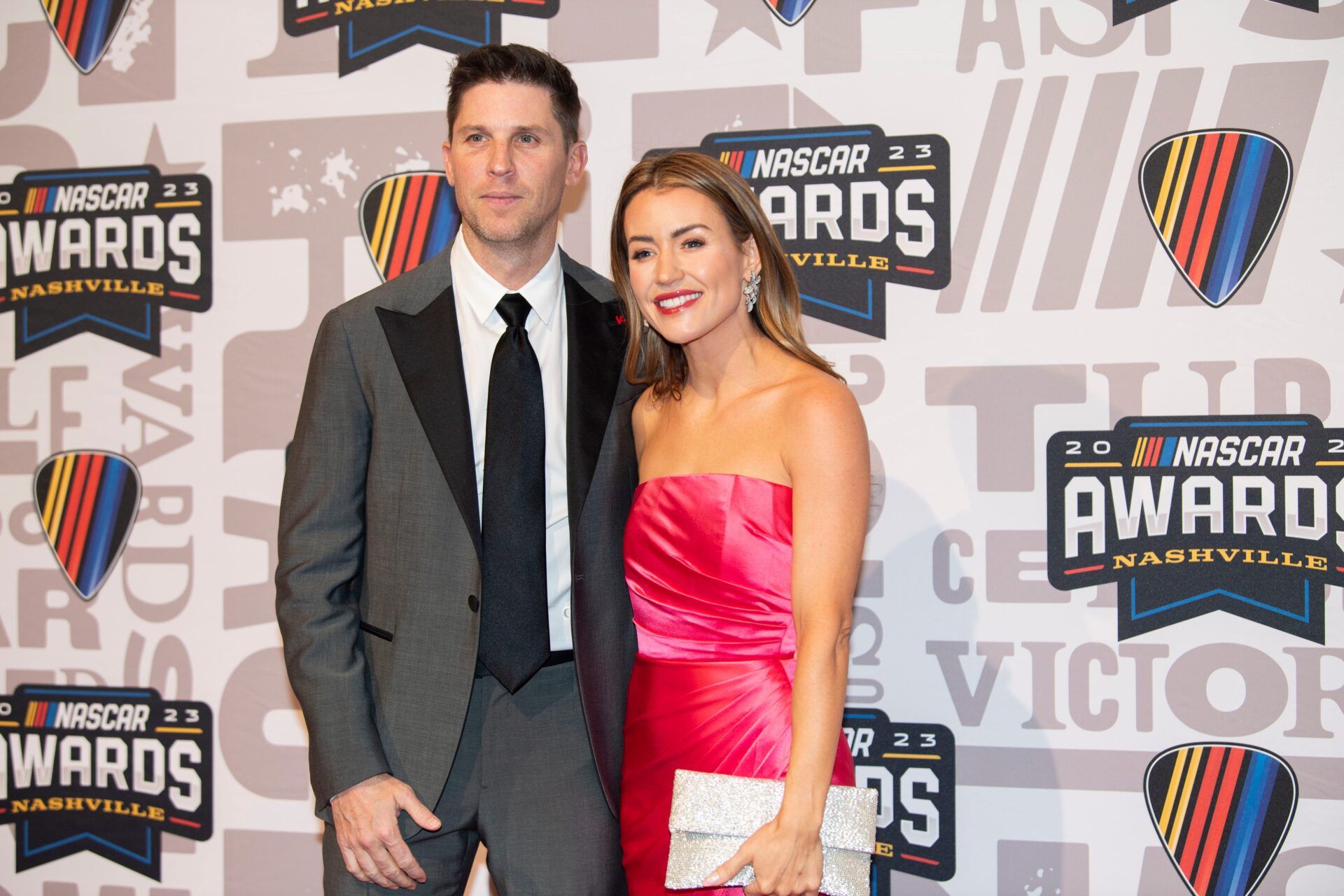Denny Hamlin and Jordan Fish poses on the red carpet for the 2023 NASCAR Awards Banquet at the Music City Center in Nashville, Tenn., Thursday, Nov. 30, 2023.