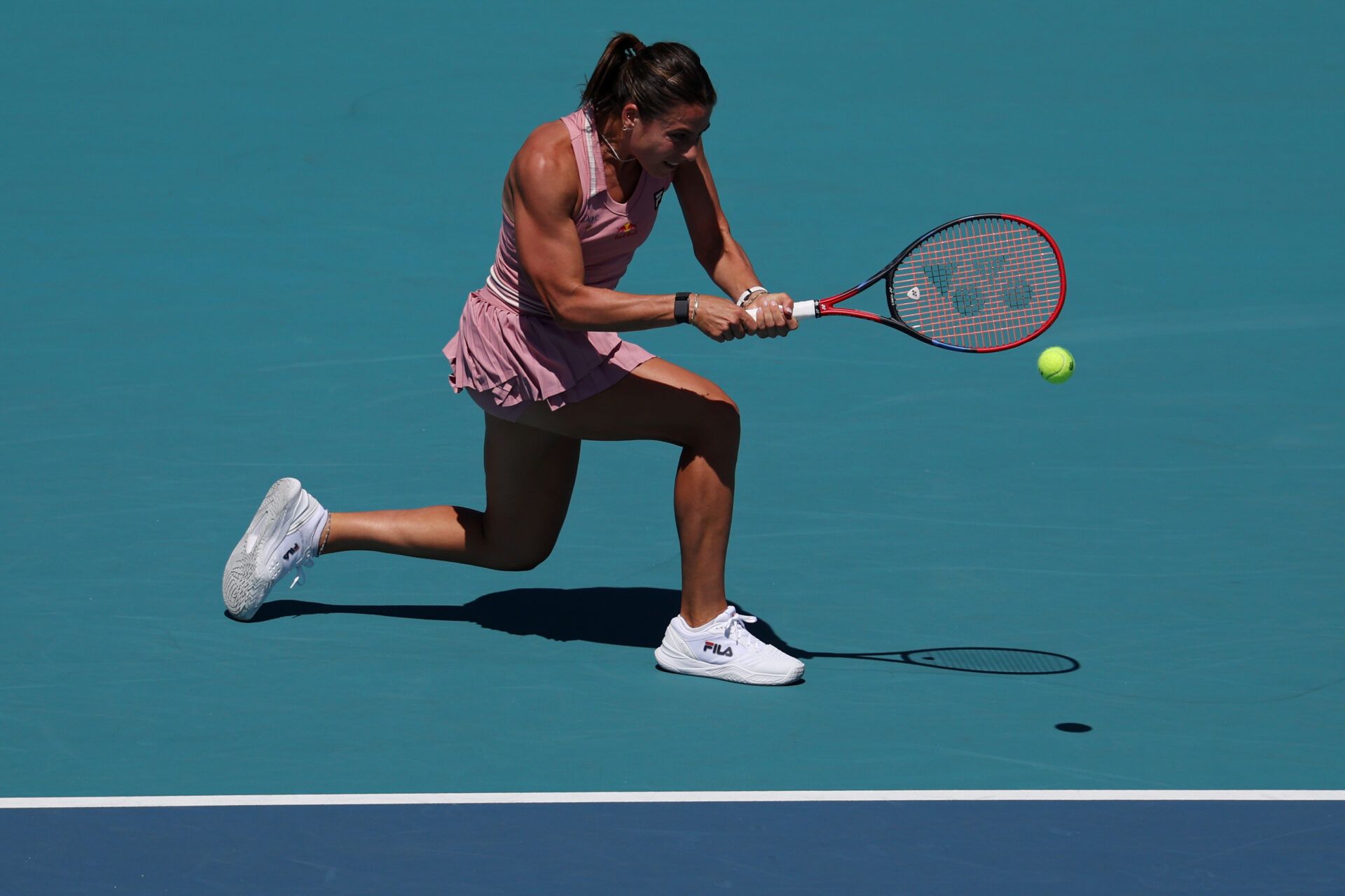 Emma Navarro (USA) hits a backhand against Emma Raducanu (GBR)(not pictured) on day four of the Miami Open at Hard Rock Stadium.