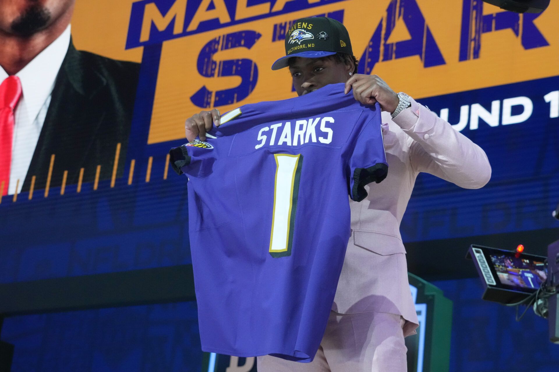 NFL commissioner Roger Goodell with Georgia Bulldogs safety Malaki Starks after he is selected by the Baltimore Ravens as the number 27 pick in the first round of the 2025 NFL Draft at Lambeau Field.