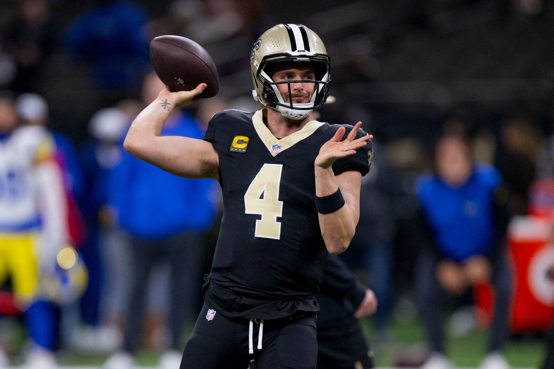 New Orleans Saints quarterback Derek Carr (4) throws before a game against the Los Angeles Rams at Caesars Superdome.
