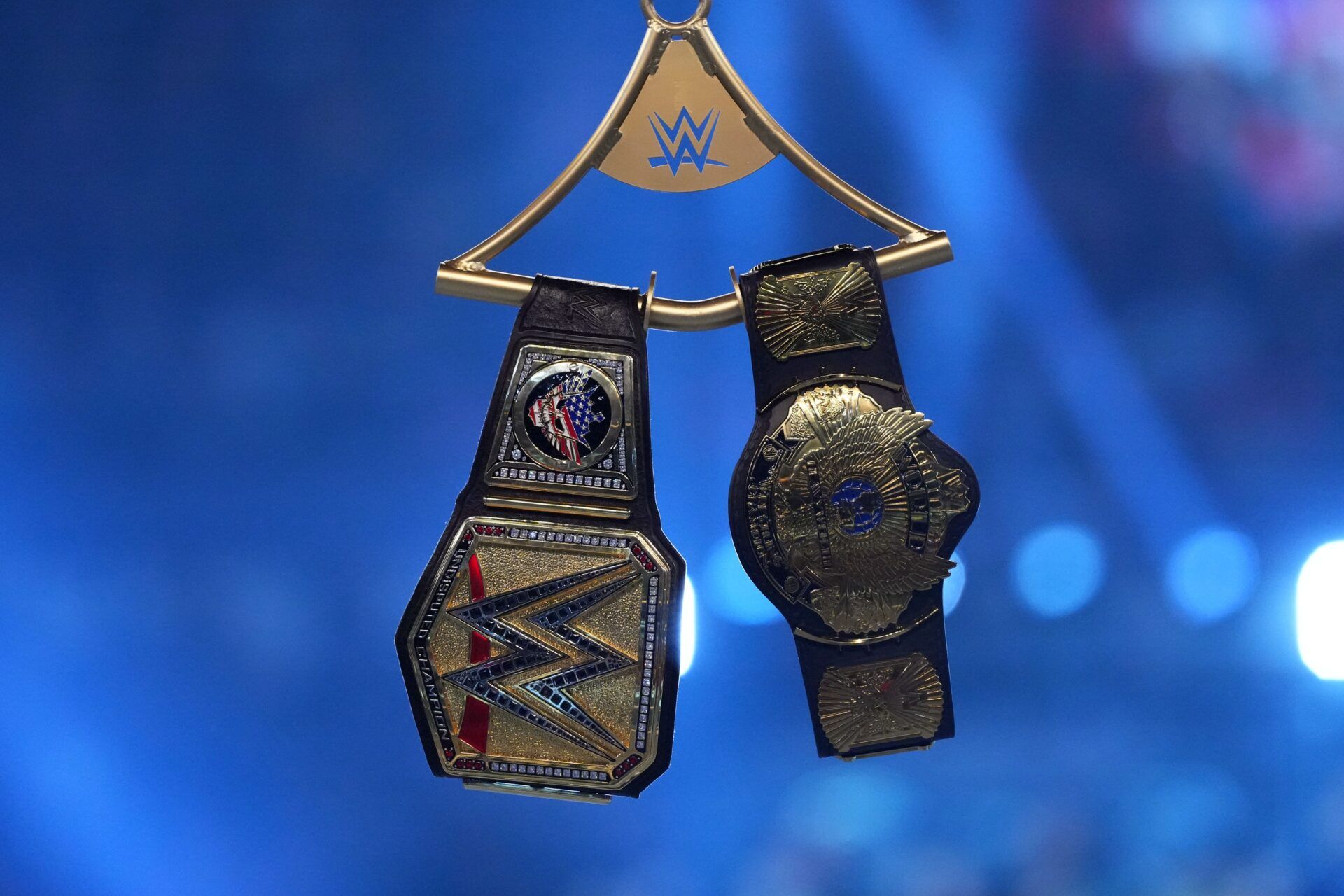 Details of the WWE Undisputed Championship belt and the Winged Eagle belt during the WWE Royal Rumble at Lucas Oil Stadium.