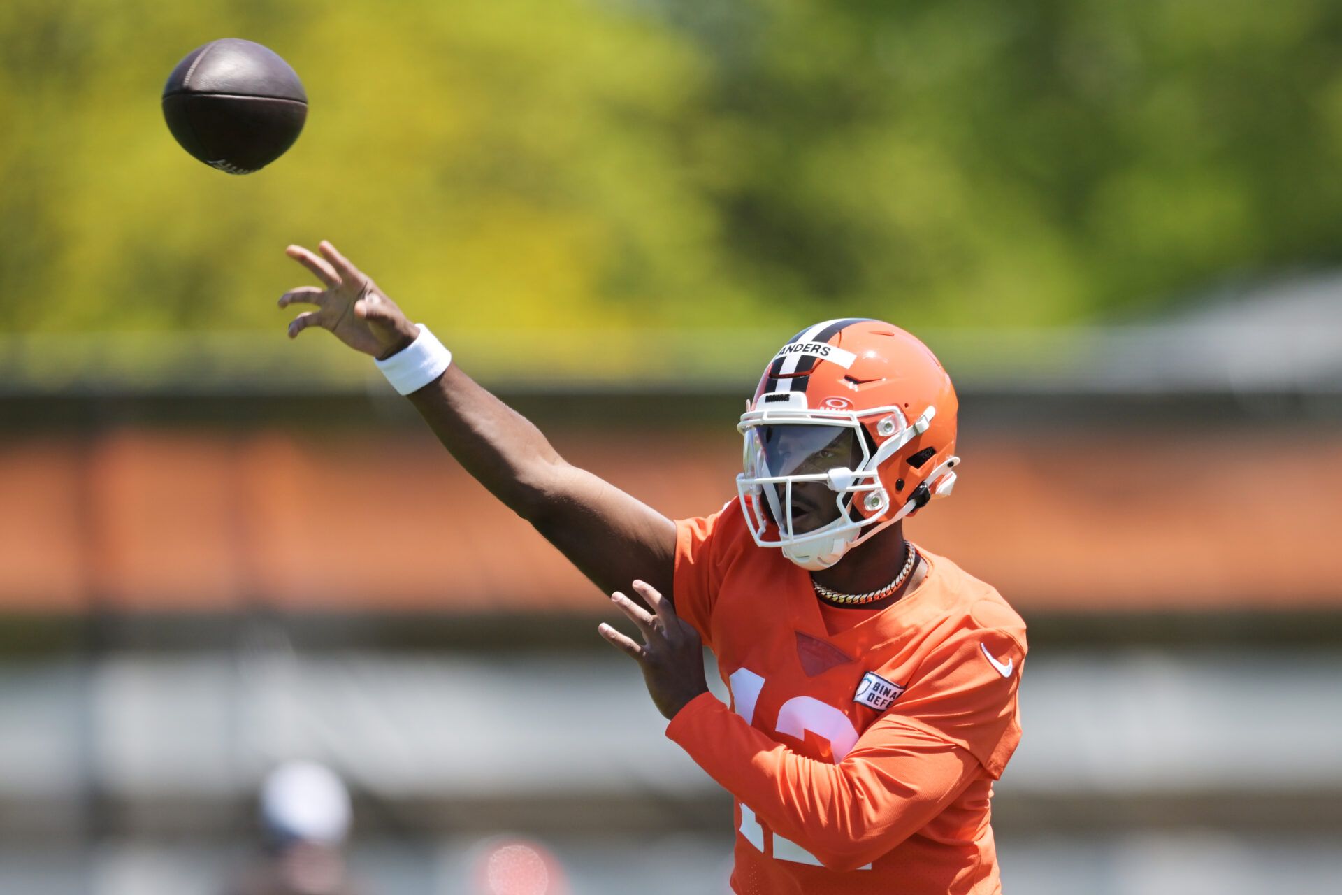Cleveland Browns quarterback Shedeur Sanders (12) throws a pass during rookie minicamp at CrossCountry Mortgage Campus.