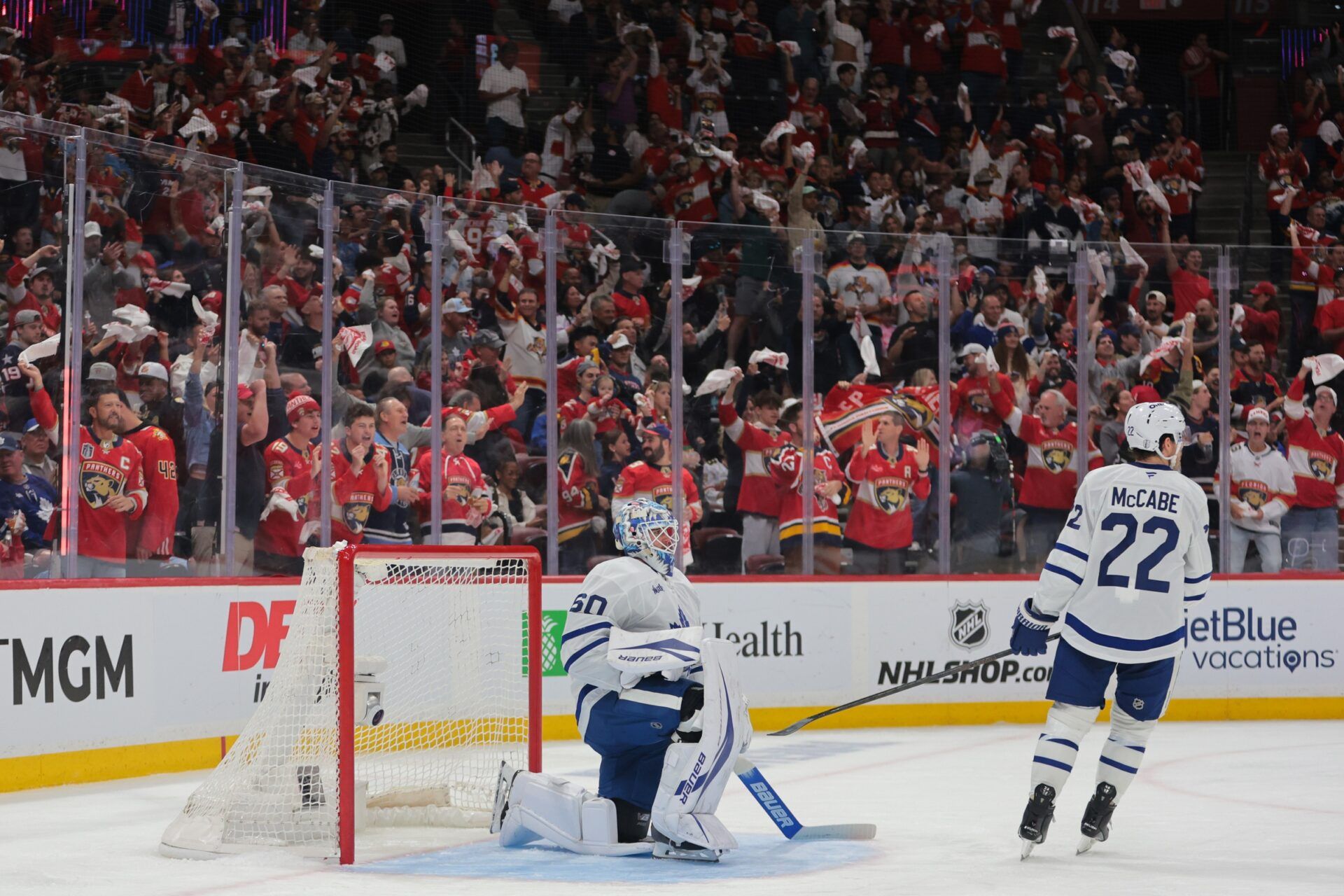 Toronto Maple Leafs goaltender Joseph Woll (60) and defenseman Jake McCabe (22) look on after. Goal by Florida Panthers center Sam Reinhart (not pictured) during the second period in game three of the second round of the 2025 Stanley Cup Playoffs at Amerant Bank Arena.