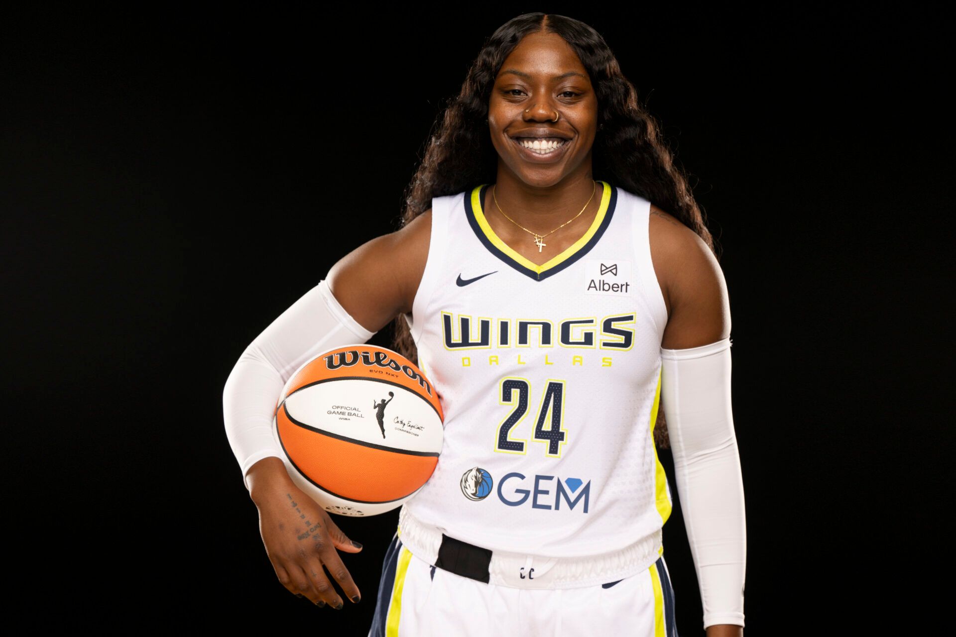 Dallas Wings guard Arike Ogunbowale poses for a photo during the 2025 Dallas Wings Media Day.