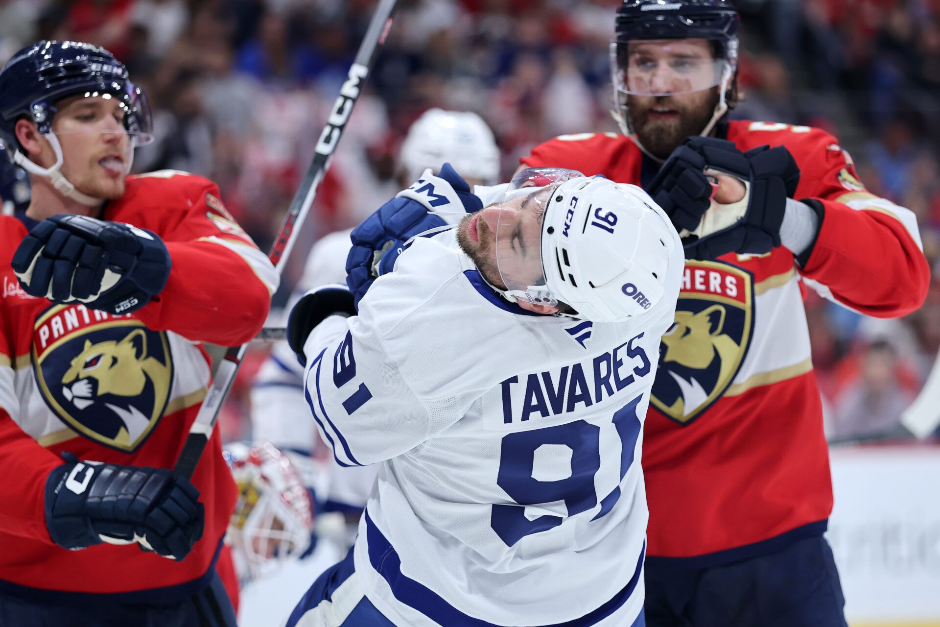 SUNRISE, FLORIDA - MAY 09: John Tavares #91 of the Toronto Maple Leafs collides with Aaron Ekblad #5 of the Florida Panthers during the first period in Game Three of the Second Round of the 2025 Stanley Cup Playoffs at Amerant Bank Arena on May 09, 2025 in Sunrise, Florida. (Photo by Carmen Mandato/Getty Images)