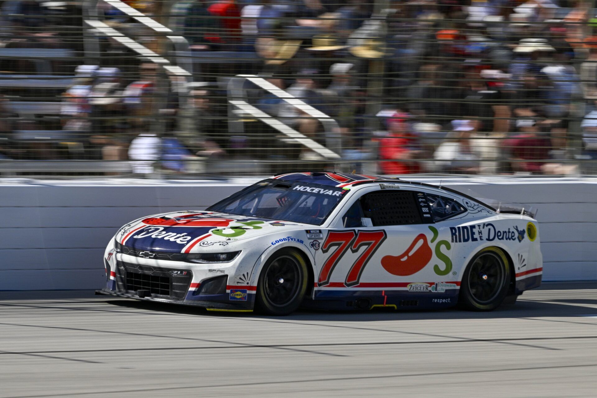 NASCAR Cup Series driver Carson Hocevar (77) drives during the Wurth 400 race at Texas Motor Speedway.