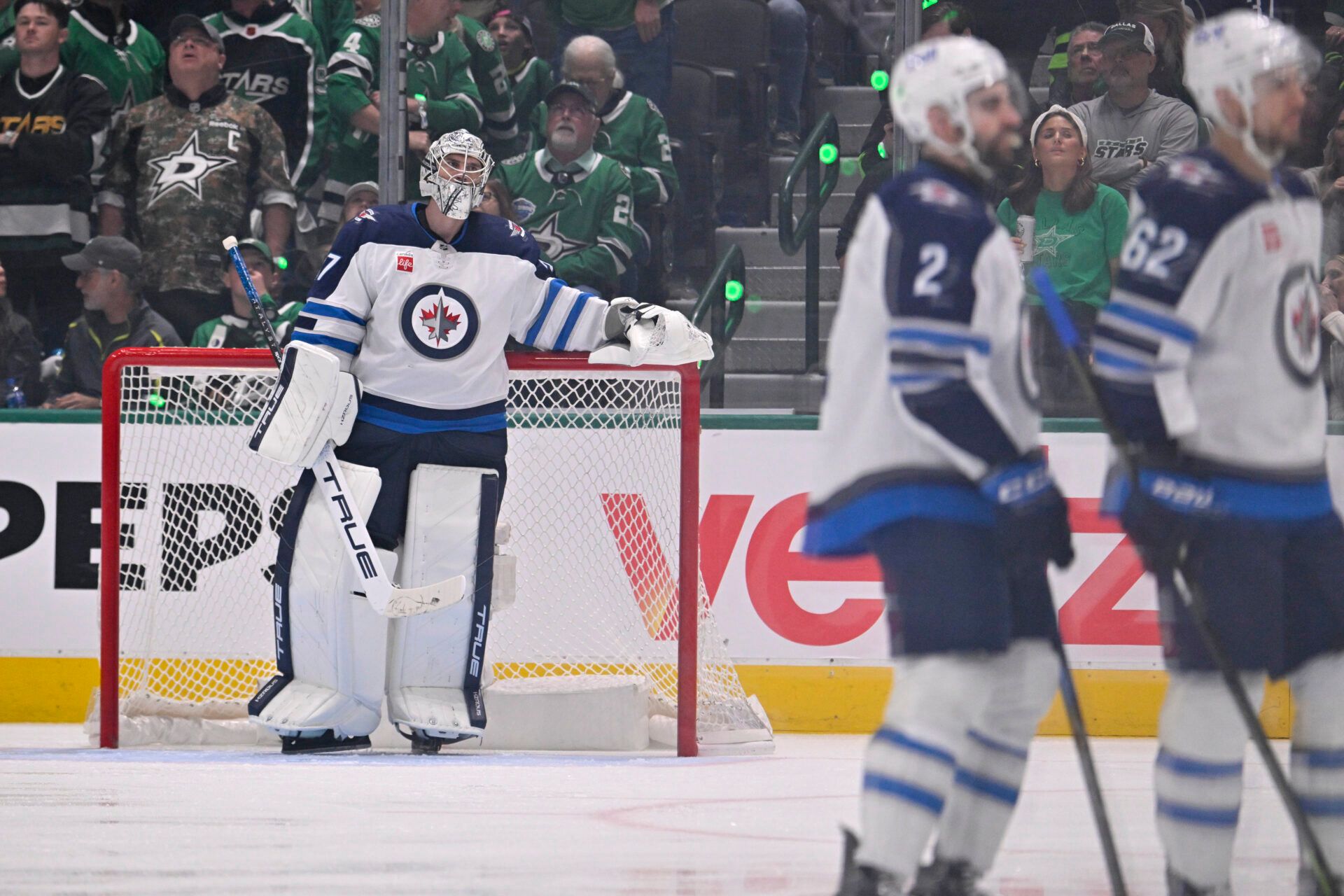 Winnipeg Jets goaltender Connor Hellebuyck (37) looks on after allowing a goal to Dallas Stars defenseman Alexander Petrovic (not pictured) during the third period in game three of the second round of the 2025 Stanley Cup Playoffs at American Airlines Center.