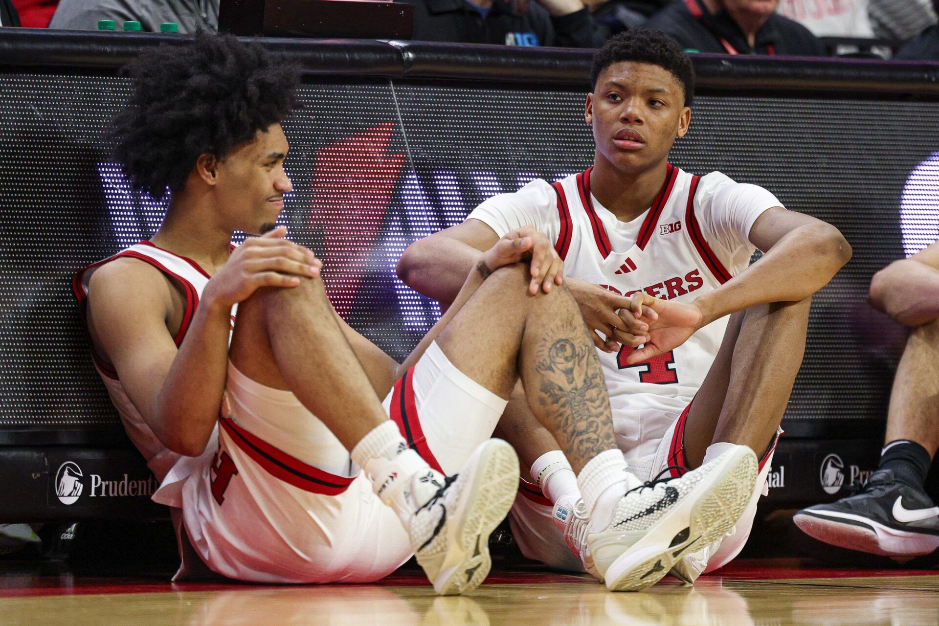 Rutgers Scarlet Knights guard Dylan Harper (2) and Rutgers Scarlet Knights guard Ace Bailey (4) looks on during the second half against the Minnesota Golden Gophers at Jersey Mike's Arena.