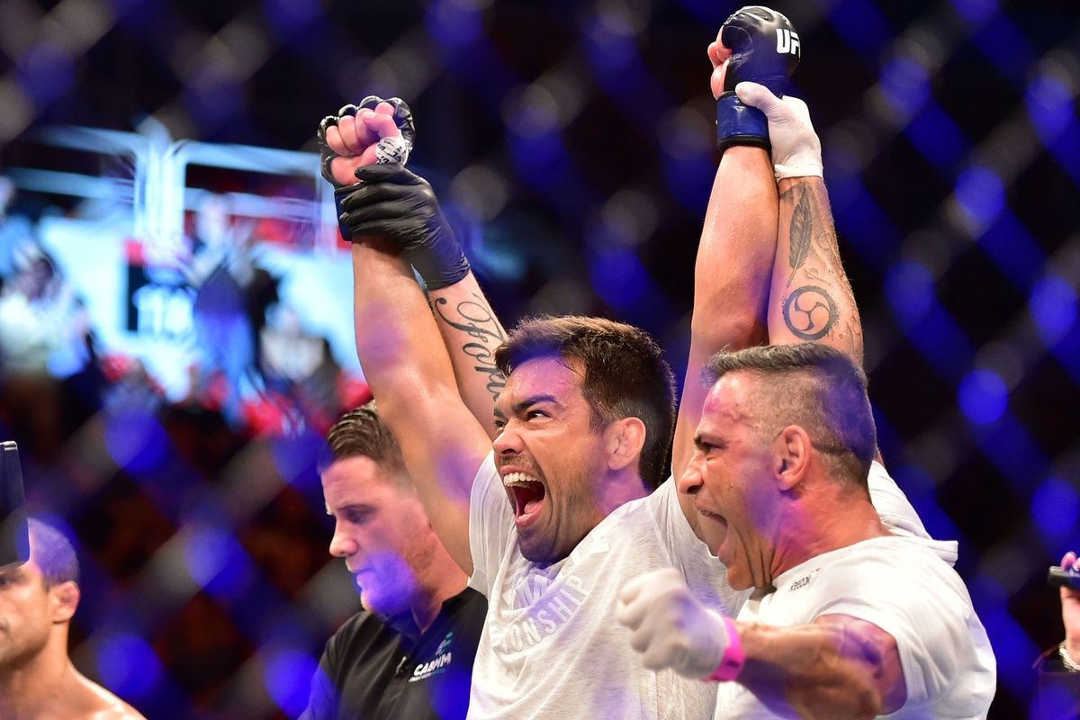 Lyoto Machida celebrates after defeating Vitor Belfort (not seen)​ during UFC 224 at Jeunesse Arena.