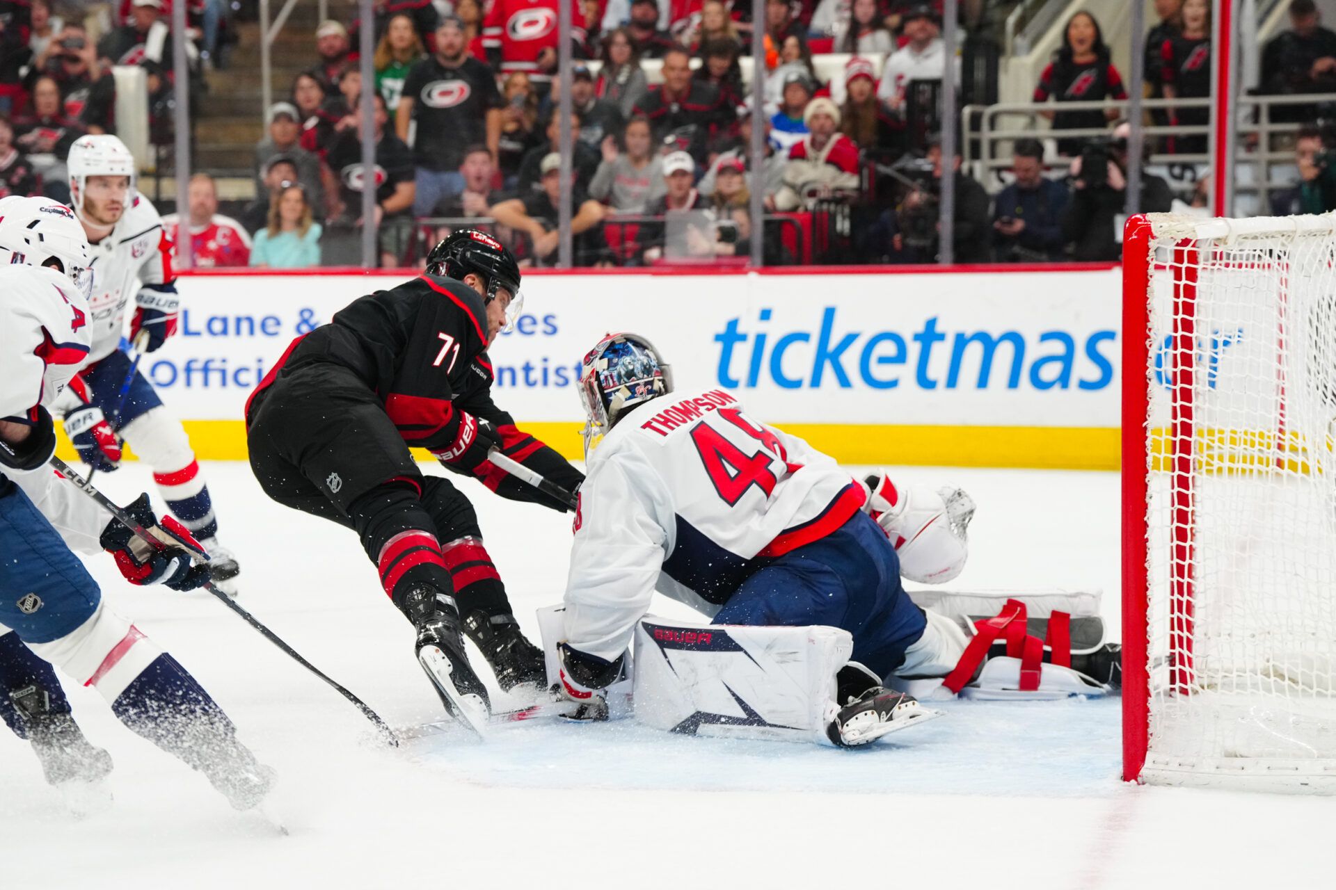 Washington Capitals goaltender Logan Thompson (48) stops the scoring attempt by Carolina Hurricanes left wing Taylor Hall (71) during the third period in game three of the second round of the 2025 Stanley Cup Playoffs at Lenovo Center.