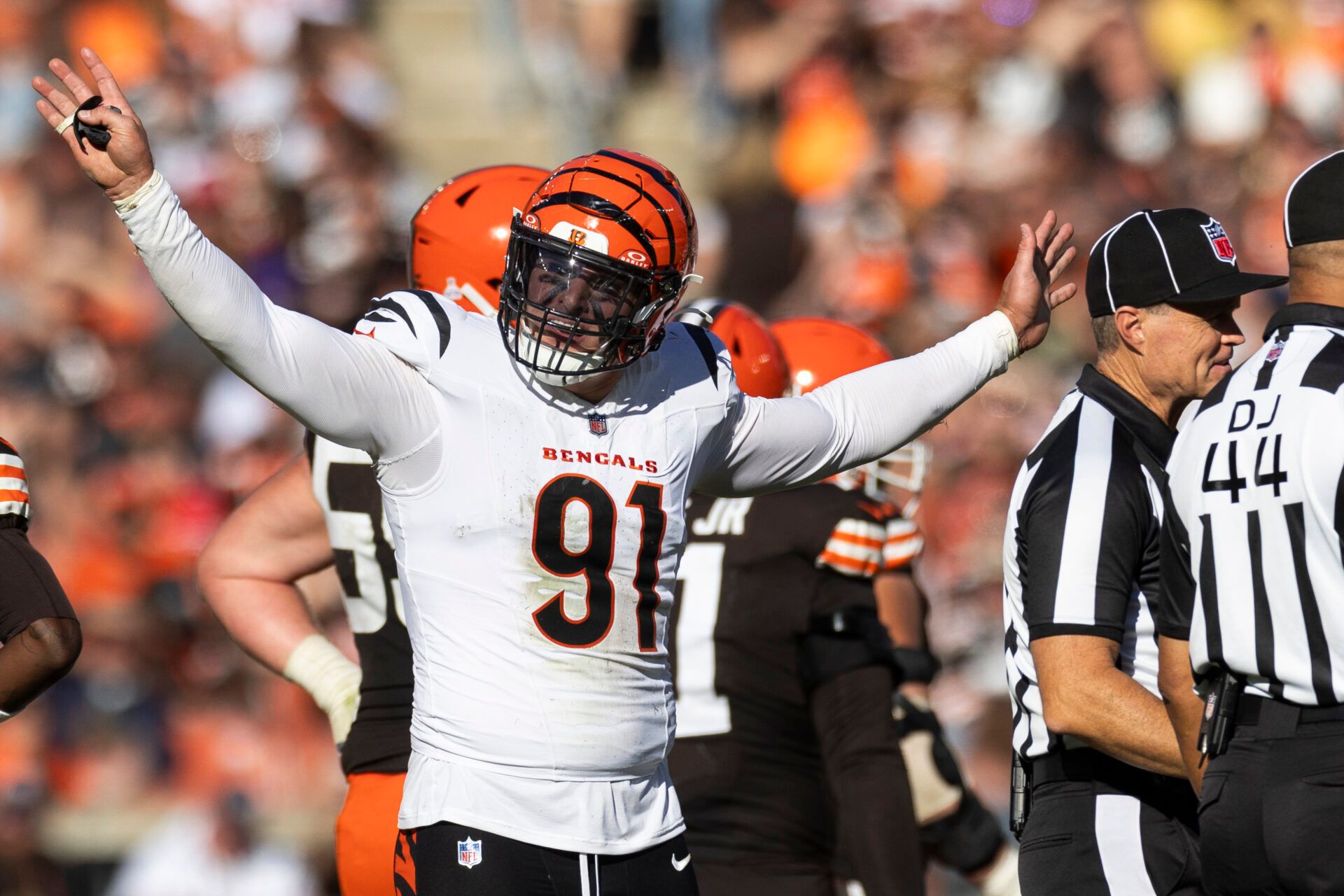 Cincinnati Bengals defensive end Trey Hendrickson (91) reacts following penalty flags being thrown during the fourth quarter against the Cleveland Browns at Huntington Bank Field. The penalties were against the Browns.