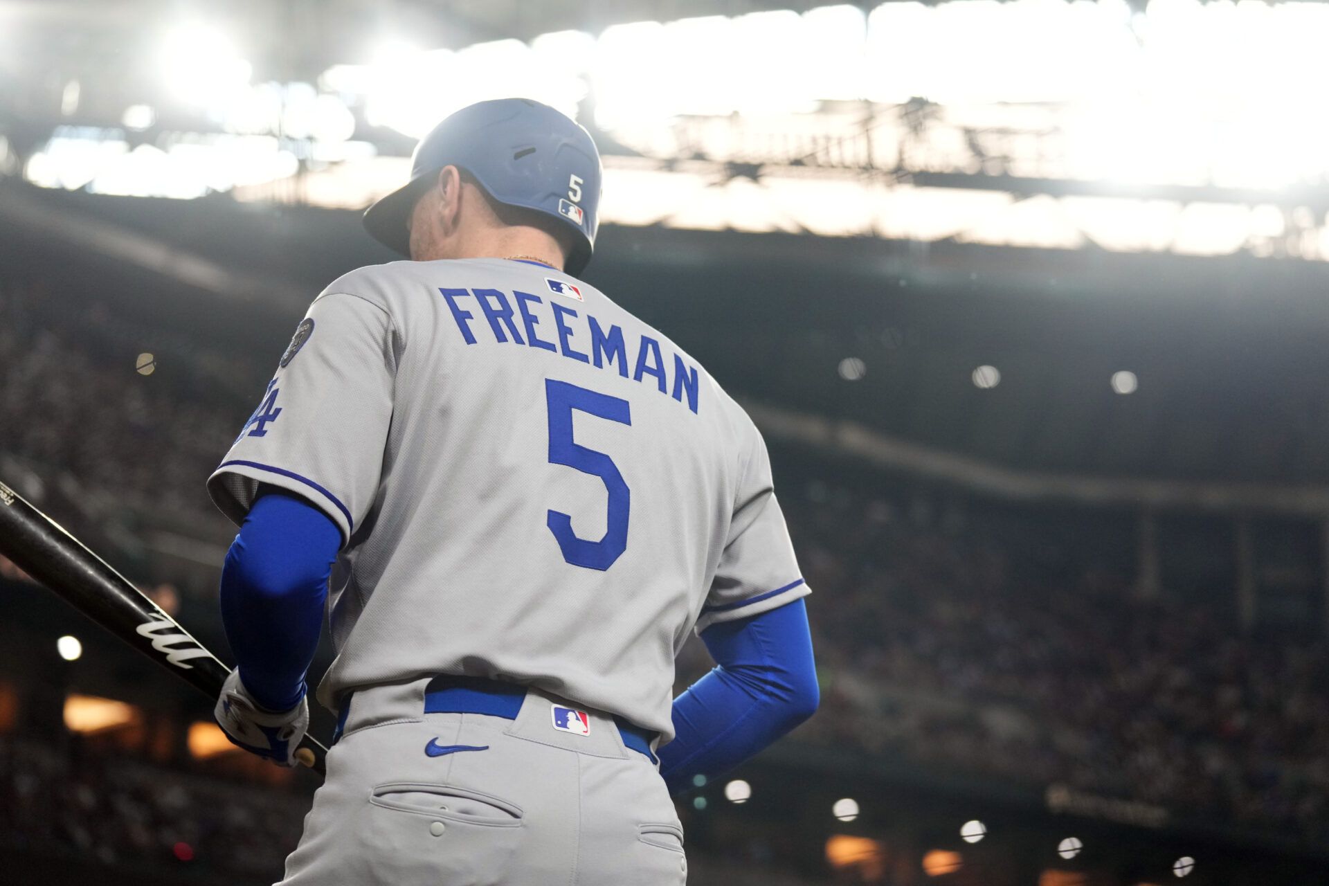 Los Angeles Dodgers first base Freddie Freeman (5) looks on against the Arizona Diamondbacks during the third inning at Chase Field.