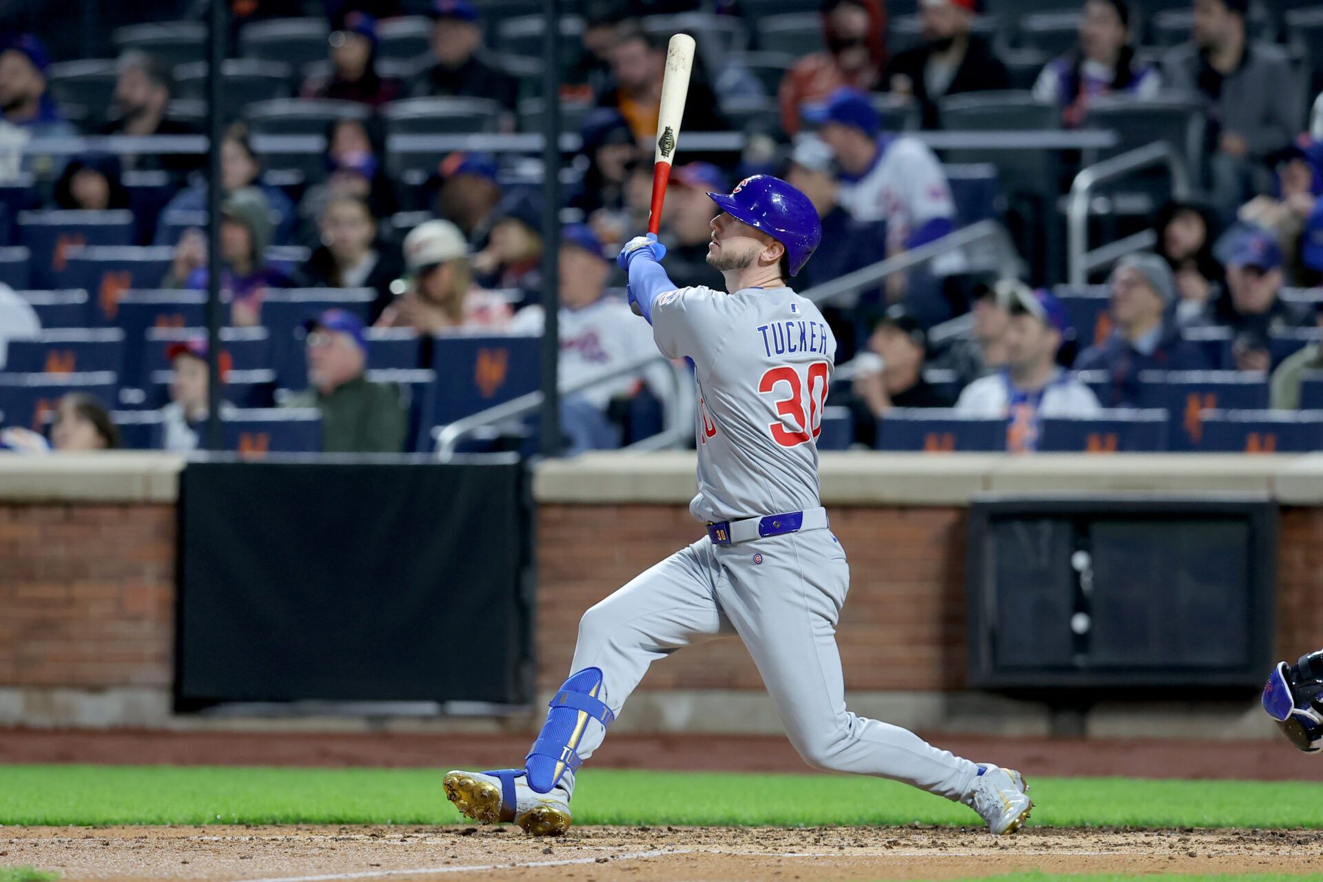 Chicago Cubs right fielder Kyle Tucker (30) follows through on a solo home run against the New York Mets during the fourth inning at Citi Field.