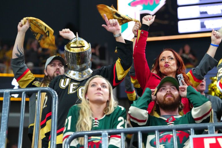 Vegas Golden Knights fans celebrate a goal scored against the Minnesota Wild by Vegas Golden Knights right wing Mark Stone (61) during the first period of game five of the first round of the 2025 Stanley Cup Playoffs at T-Mobile Arena.
