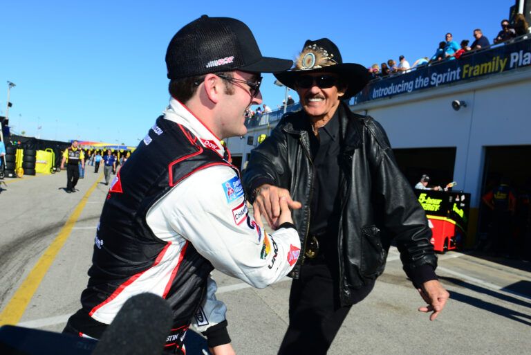 NASCAR Sprint Car driver Austin Dillon is congratulated by Richard Petty after winning the pole for the Daytona 500 at Daytona International Speedway.