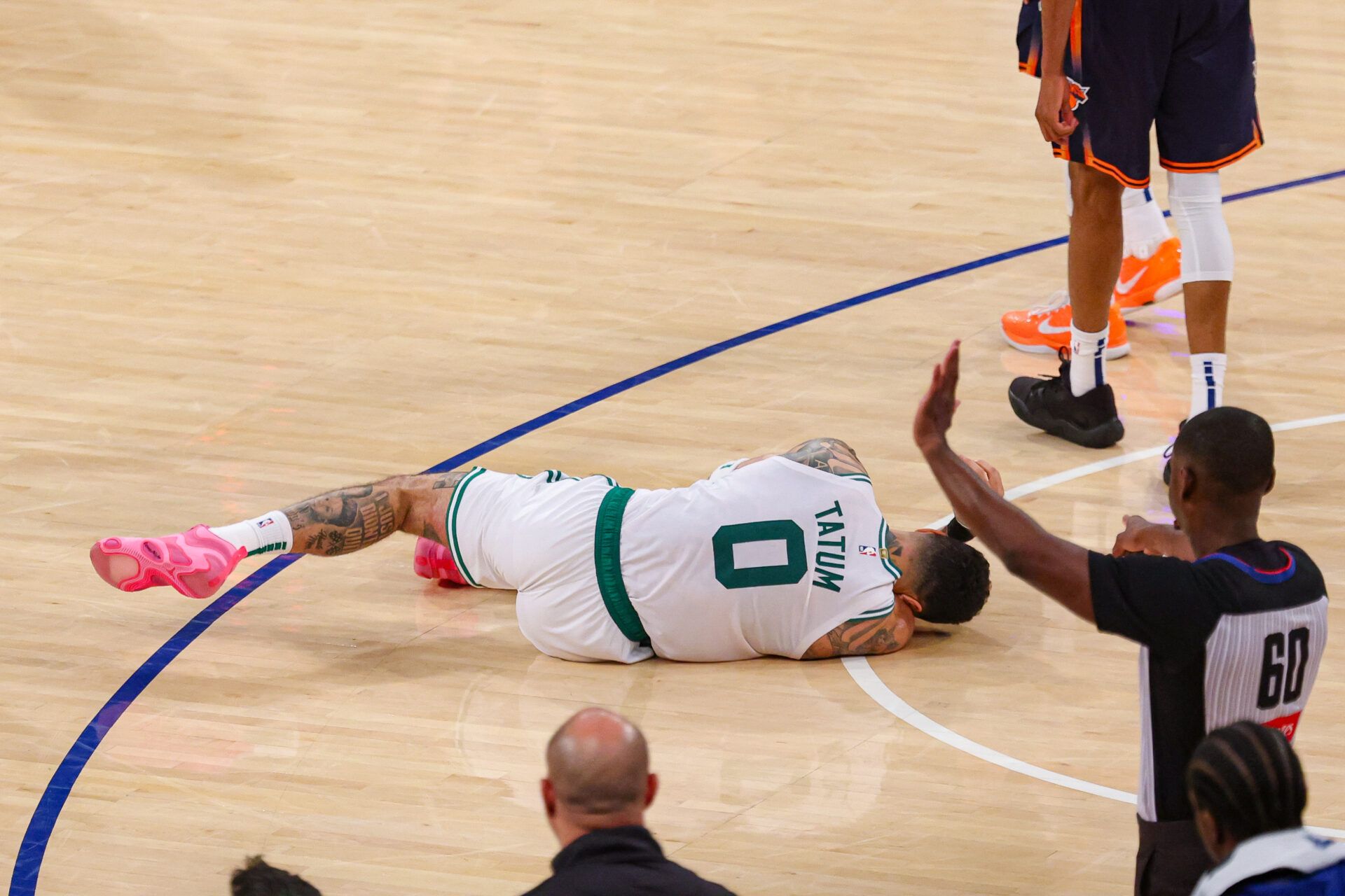Boston Celtics forward Jayson Tatum (0) reacts on the court after an injury in the second half during game four of the second round for the 2025 NBA Playoffs against the New York Knicks at Madison Square Garden. Tatum would leave the game with an injury after this play.