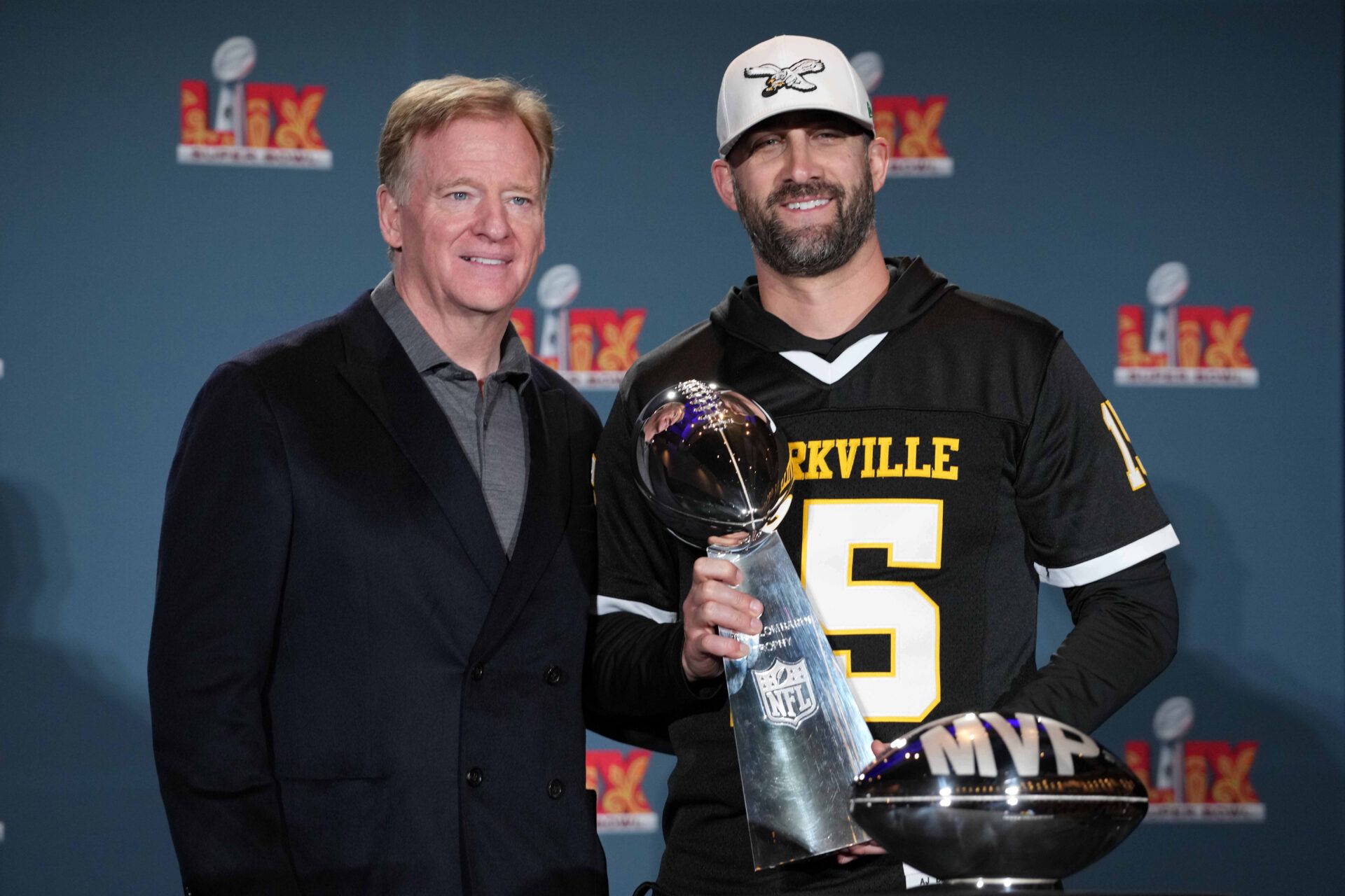 NFL commissioner Roger Goodell (left) and Philadelphia Eagles coach Nick Sirianni pose with the Vince Lombardi trophy at the Super Bowl LIX Winning Head Coach and Most Valuable Player press conference at the Ernest N. Morial Convention Center.