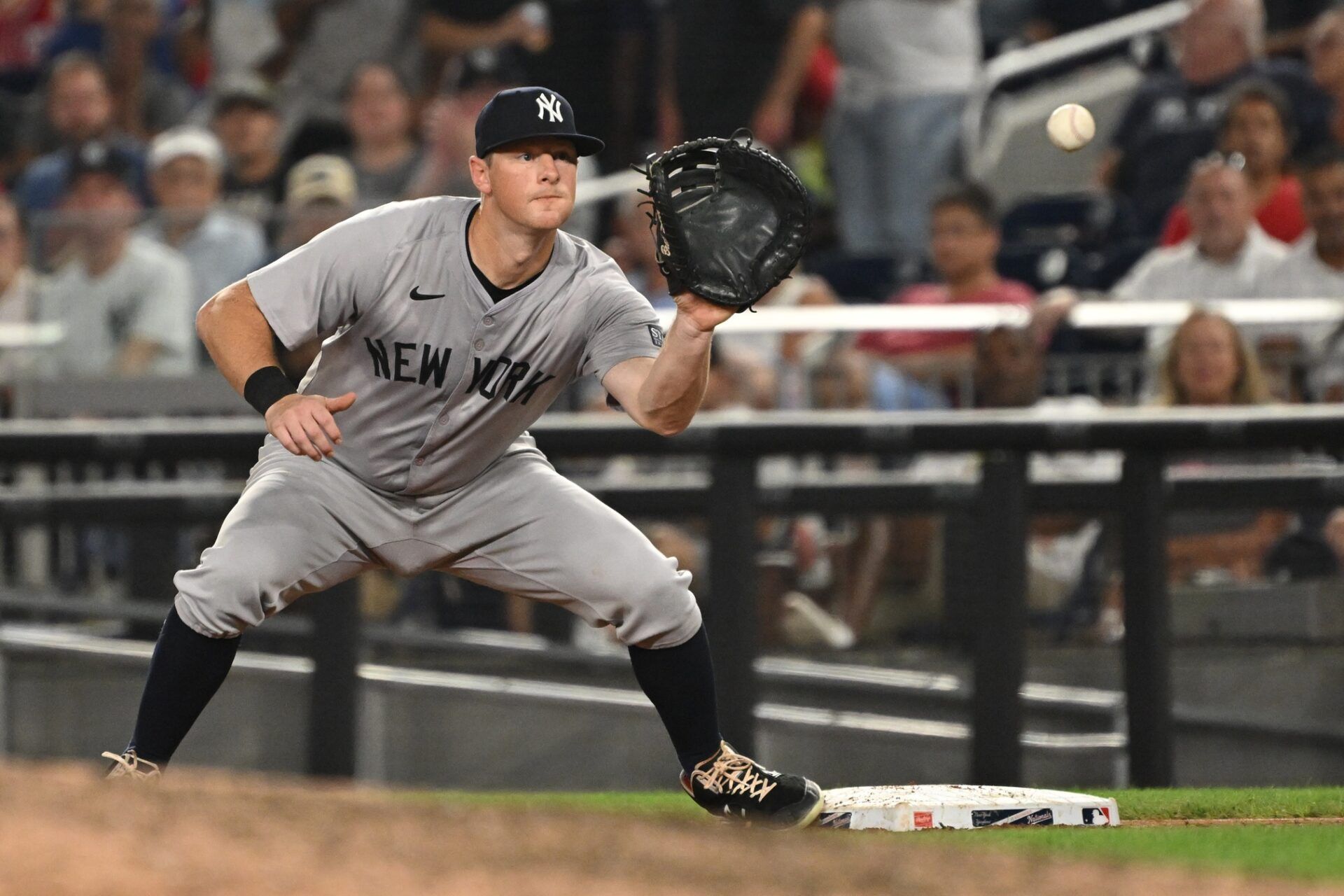 New York Yankees third baseman DJ LeMahieu (26) fields the ball at first base against the Washington Nationals during the sixth inning at Nationals Park.