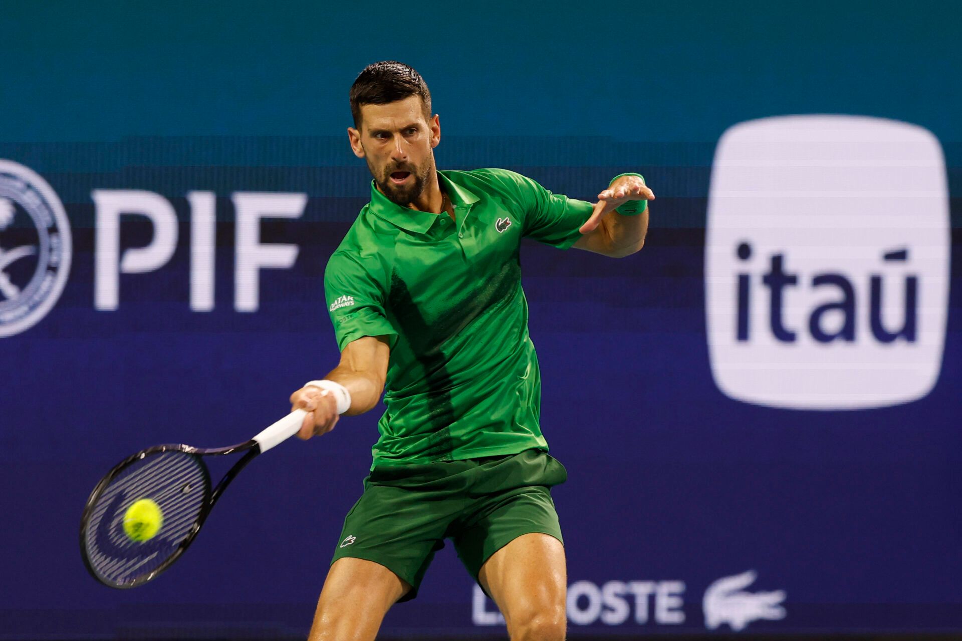 Novak Djokovic (SRB) hits a forehand against Jakub Mensik (CZE)(not pictured) in the men's singles championship of the Miami Open at Hard Rock Stadium.