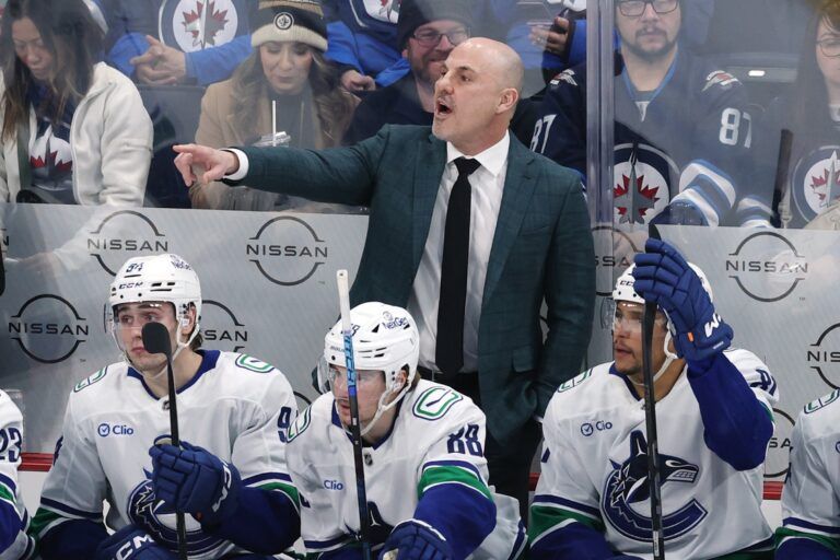 Vancouver Canucks head coach Rick Tocchet gestures during a game against the Winnipeg Jets in the third period at Canada Life Centre.