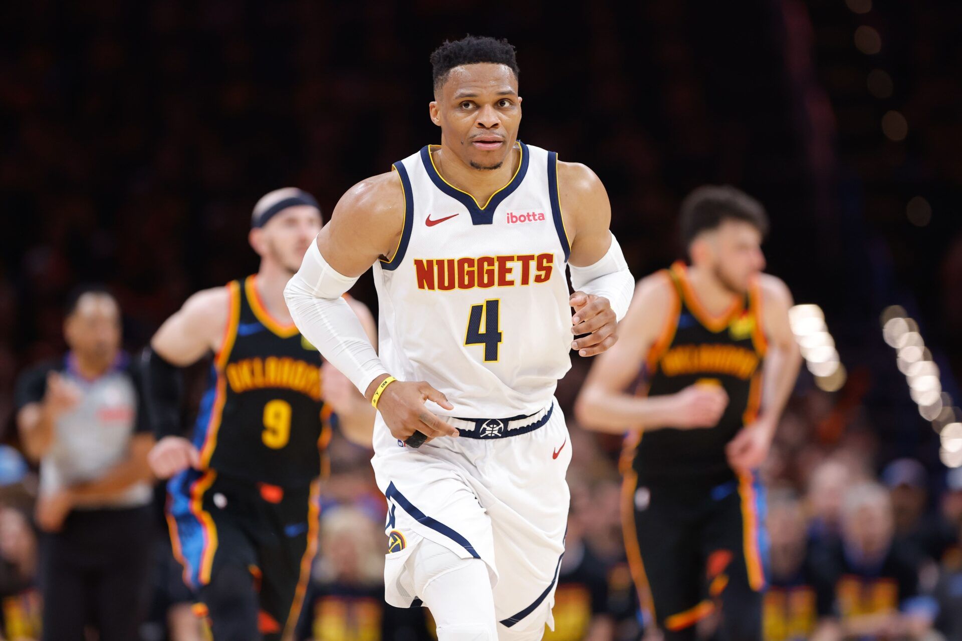 Denver Nuggets guard Russell Westbrook (4) runs down the court after a play against the Oklahoma City Thunder during the second half during game one of the second round for the 2025 NBA Playoffs at Paycom Center.