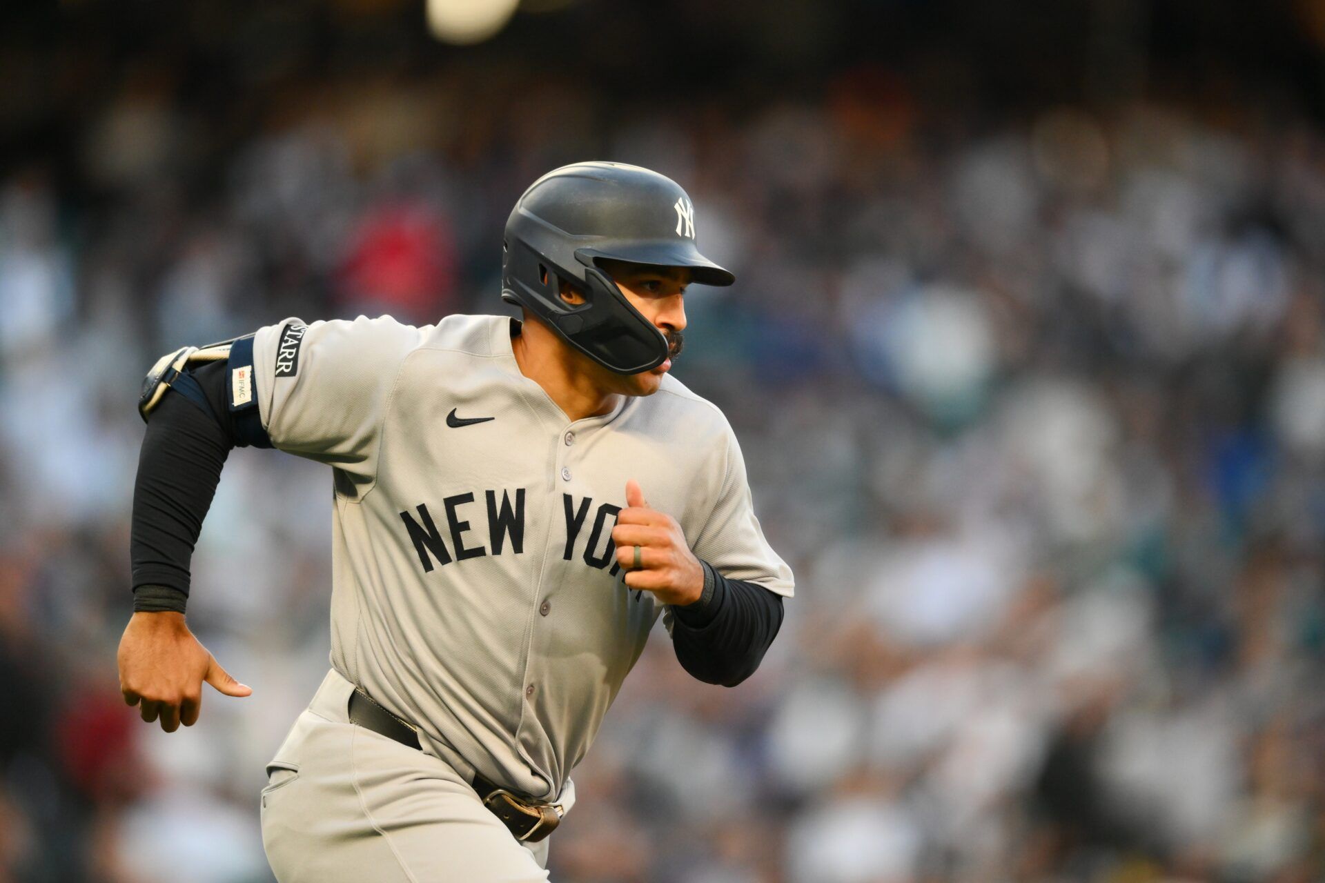 New York Yankees center fielder Trent Grisham (12) runs the bases after hitting a home run against the Seattle Mariners during the fifth inning at T-Mobile Park.