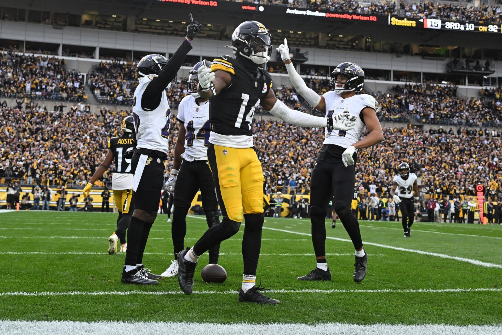 Pittsburgh Steelers wide receiver George Pickens (14) reacts to an official after an incomplete pass in the end zone against the Baltimore Ravens during the fourth quarter at Acrisure Stadium.
