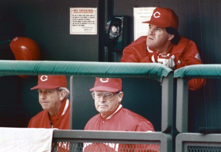 APRIL 9, 1989: Reds' coach Tommy Helms, coach Scott Breeden, and manager Pete Rose.
