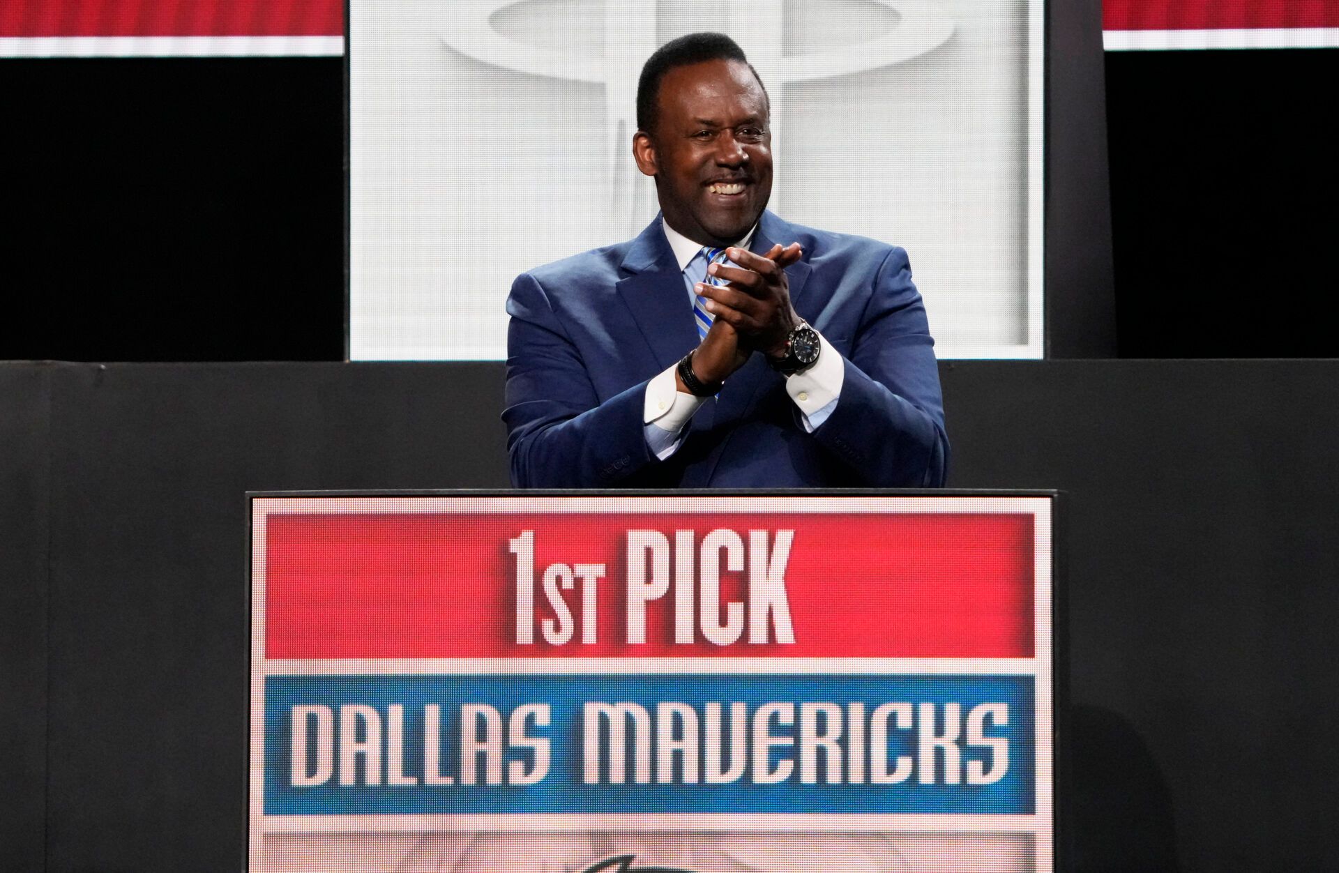 Rolando Blackman of the Dallas Mavericks reacts after winning the the first pick during the 2025 NBA Draft Lottery at McCormick Place.