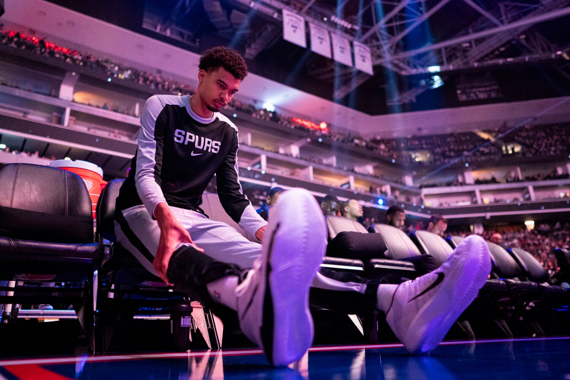 San Antonio Spurs center Victor Wembanyama (1) sits on the bench before the game against the Sacramento Kings at Golden 1 Center.