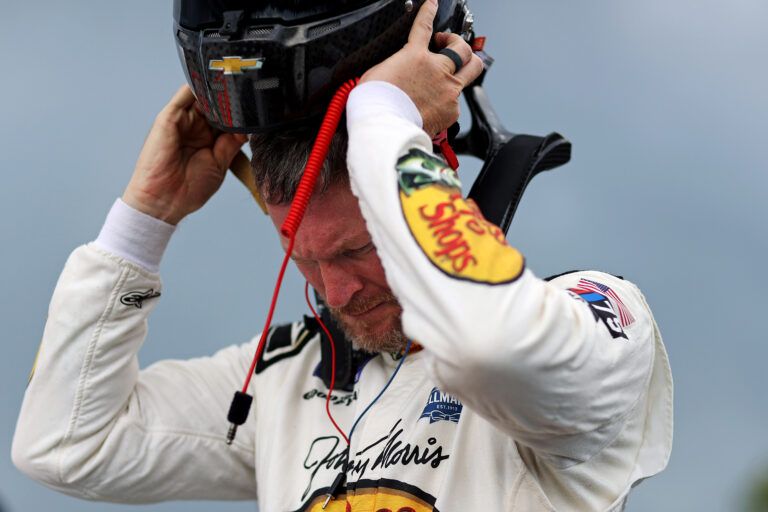 Dale Earnhardt Jr. puts his helmet during qualifying for the 16th Annual Hampton Heat at Langley Speedway.