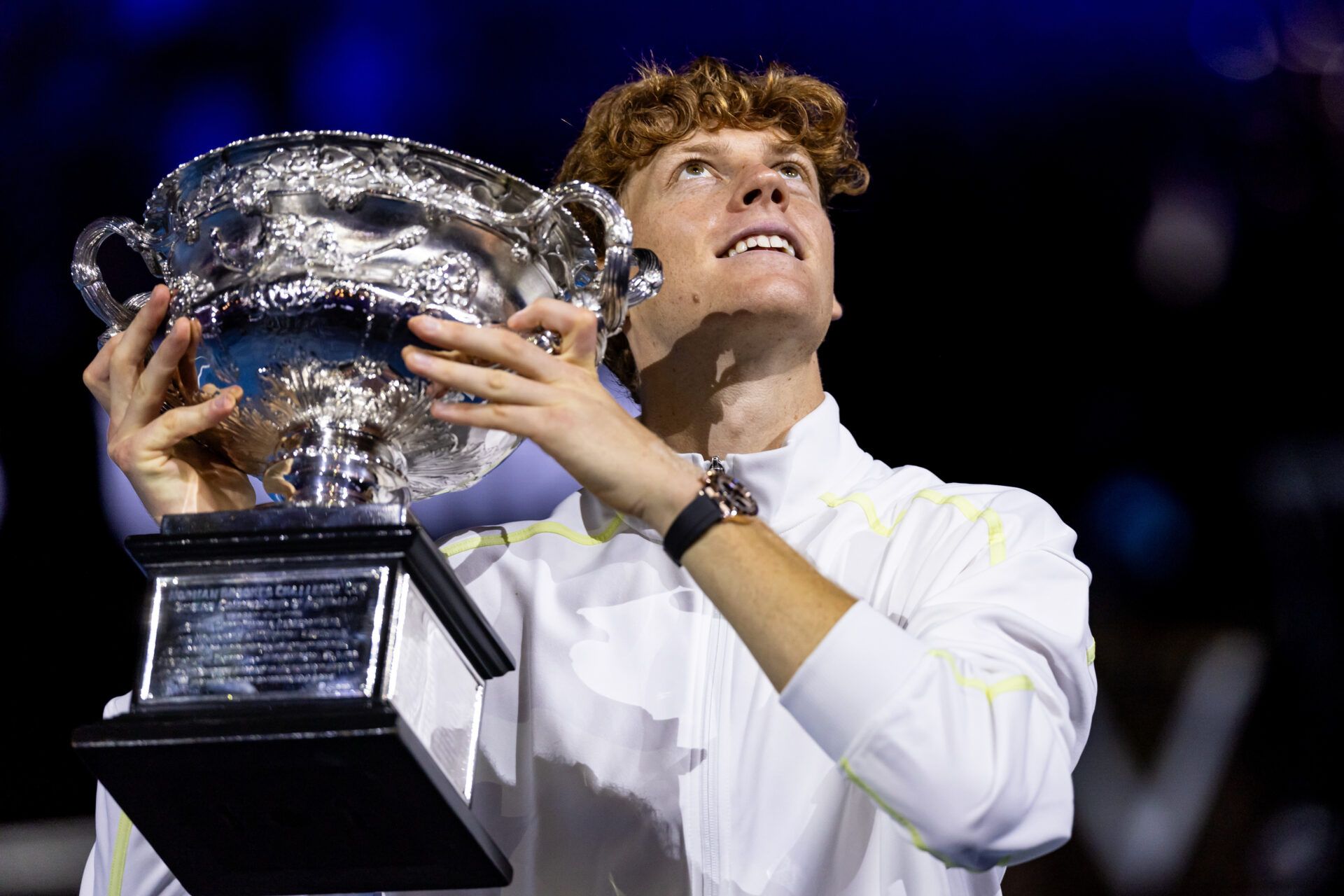 Jannik Sinner of Italy celebrates with the Australian Open title during the prize presentation of the men's single at the 2025 Australian Open at Melbourne Park.