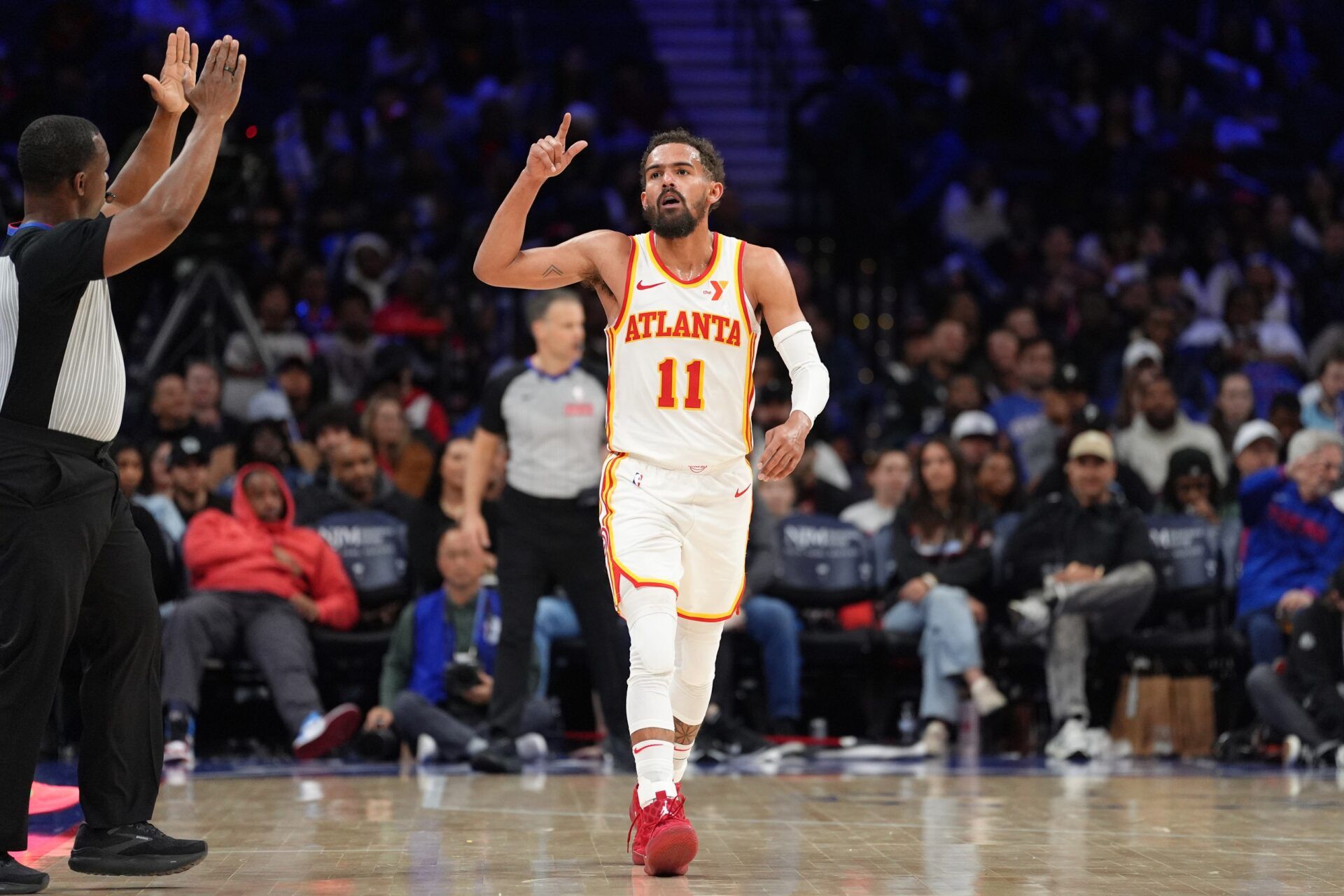 Atlanta Hawks guard Trae Young (11) reacts after scoring against the Philadelphia 76ers in the fourth quarter at Wells Fargo Center.
