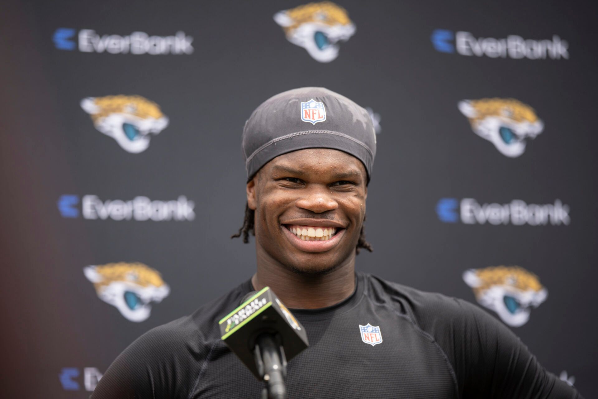 JACKSONVILLE, FLORIDA - MAY 10: Travis Hunter #12 of the  Jacksonville Jaguars speaks to the Media during Jacksonville Jaguars Rookie Minicamp at Miller Electric Center on May 10, 2025 in Jacksonville, Florida. (Photo by James Gilbert/Getty Images)
