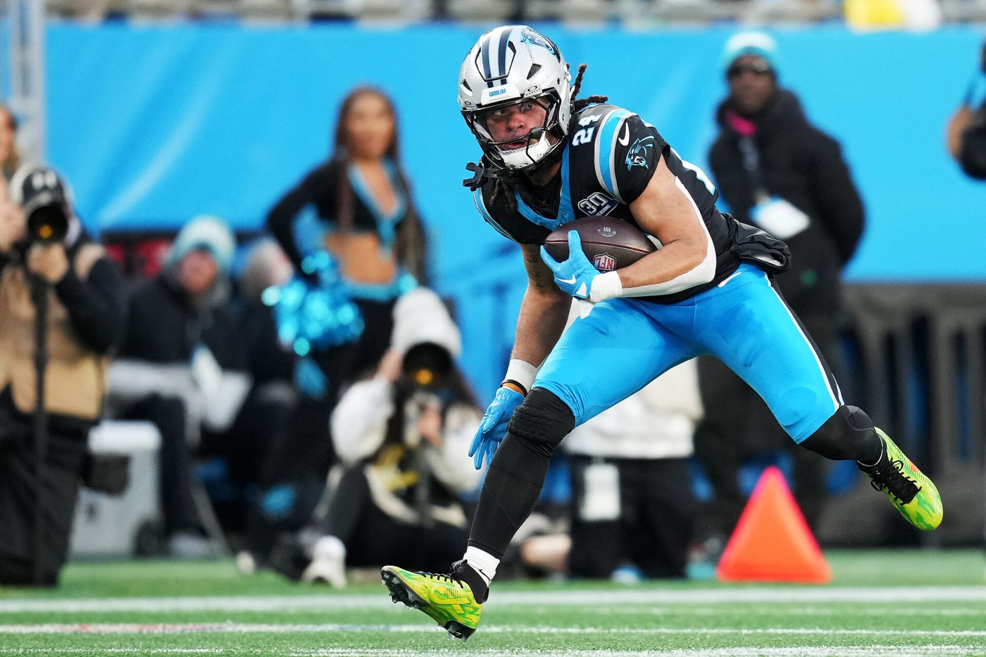 CHARLOTTE, NORTH CAROLINA - DECEMBER 01: Jonathon Brooks #24 of the Carolina Panthers runs with the ball during the first quarter of a game against the Tampa Bay Buccaneers at Bank of America Stadium on December 01, 2024 in Charlotte, North Carolina. (Photo by Grant Halverson/Getty Images)