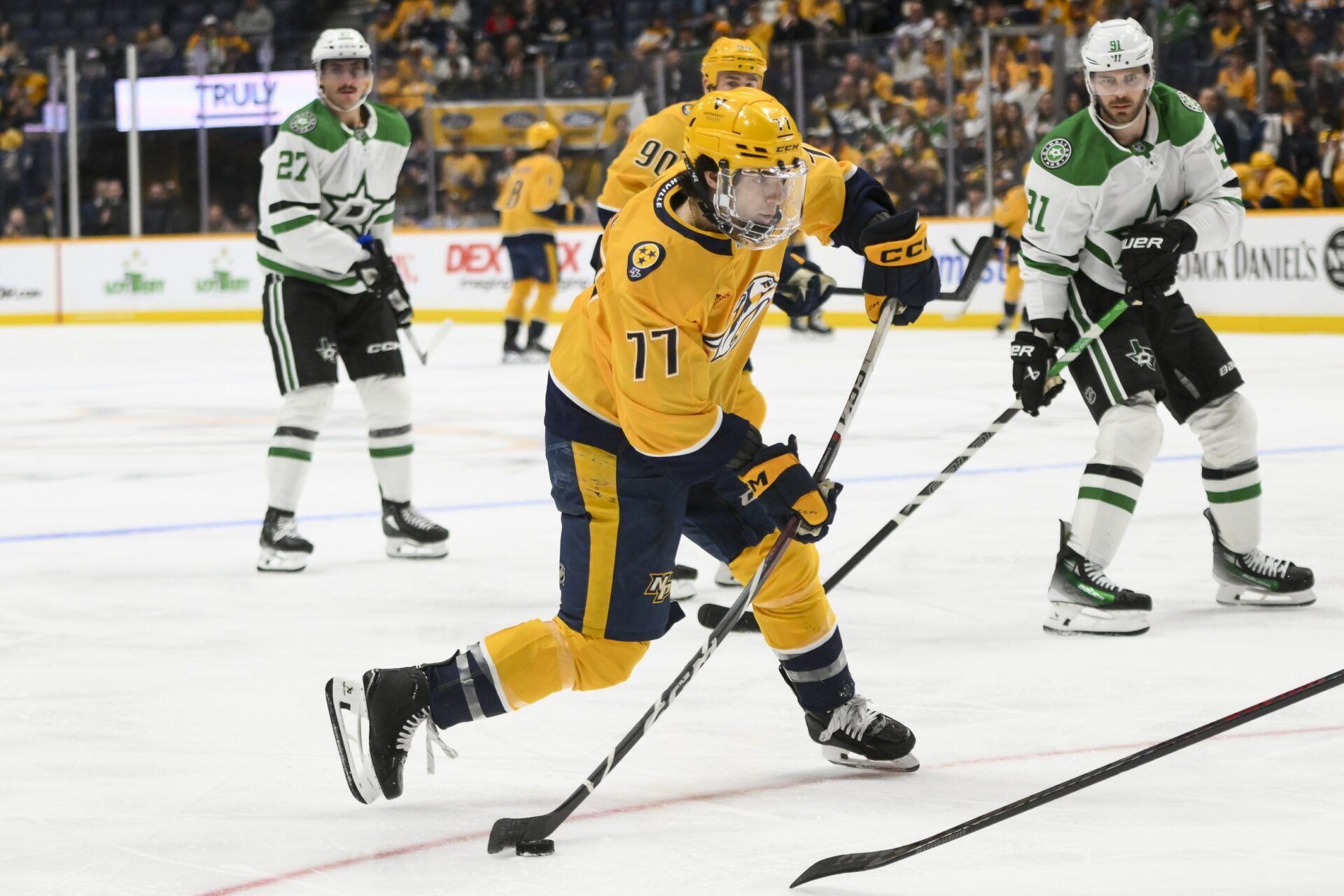 Nashville Predators right wing Luke Evangelista (77) takes a shot on goal against the Dallas Stars during the third period at Bridgestone Arena.