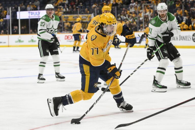 Nashville Predators right wing Luke Evangelista (77) takes a shot on goal against the Dallas Stars during the third period at Bridgestone Arena.