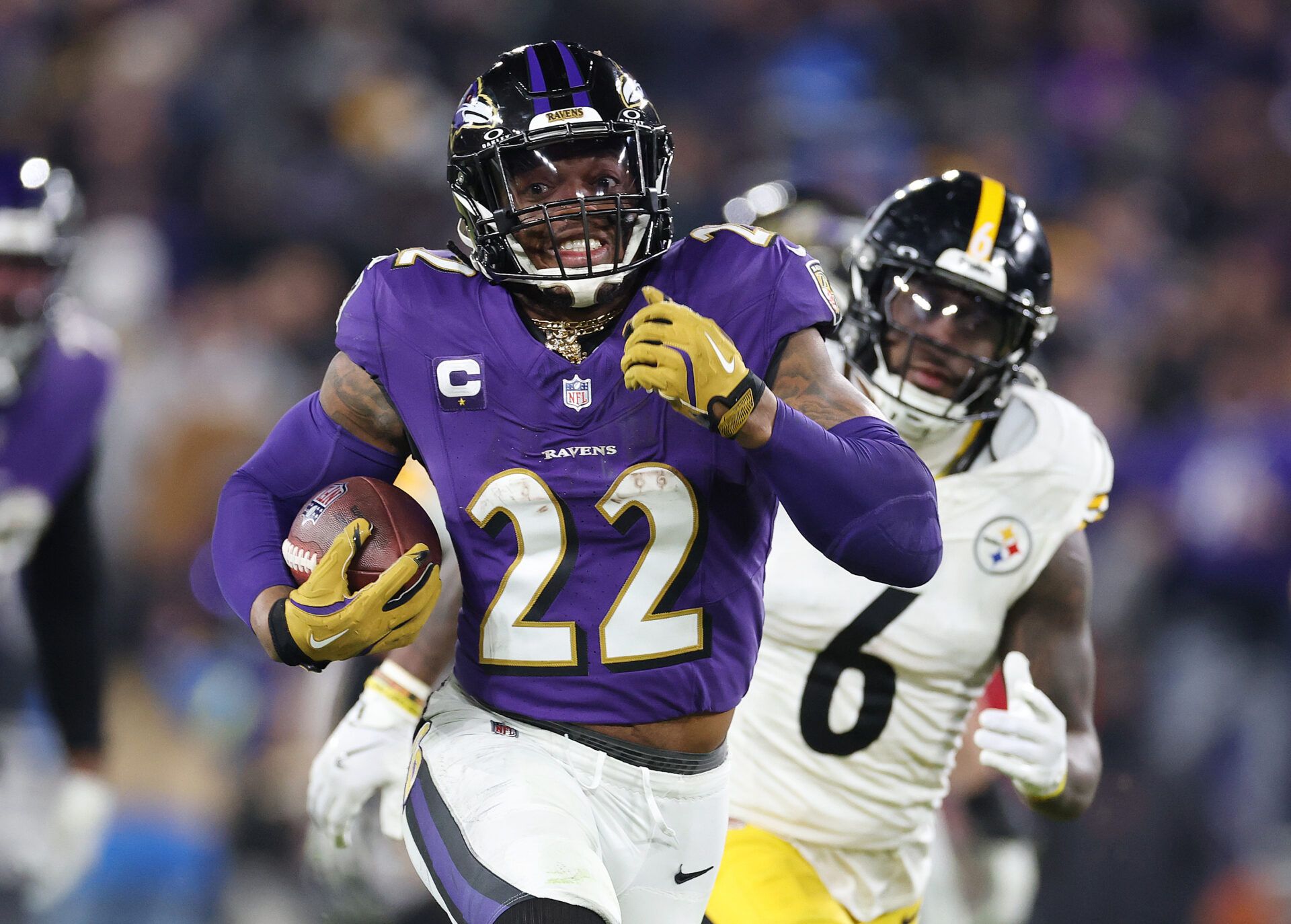 BALTIMORE, MARYLAND - JANUARY 11: Derrick Henry #22 of the Baltimore Ravens runs the ball for a touchdown during the third quarter against the Pittsburgh Steelers during the AFC Wild Card Playoff at M&T Bank Stadium on January 11, 2025 in Baltimore, Maryland.  (Photo by Al Bello/Getty Images)