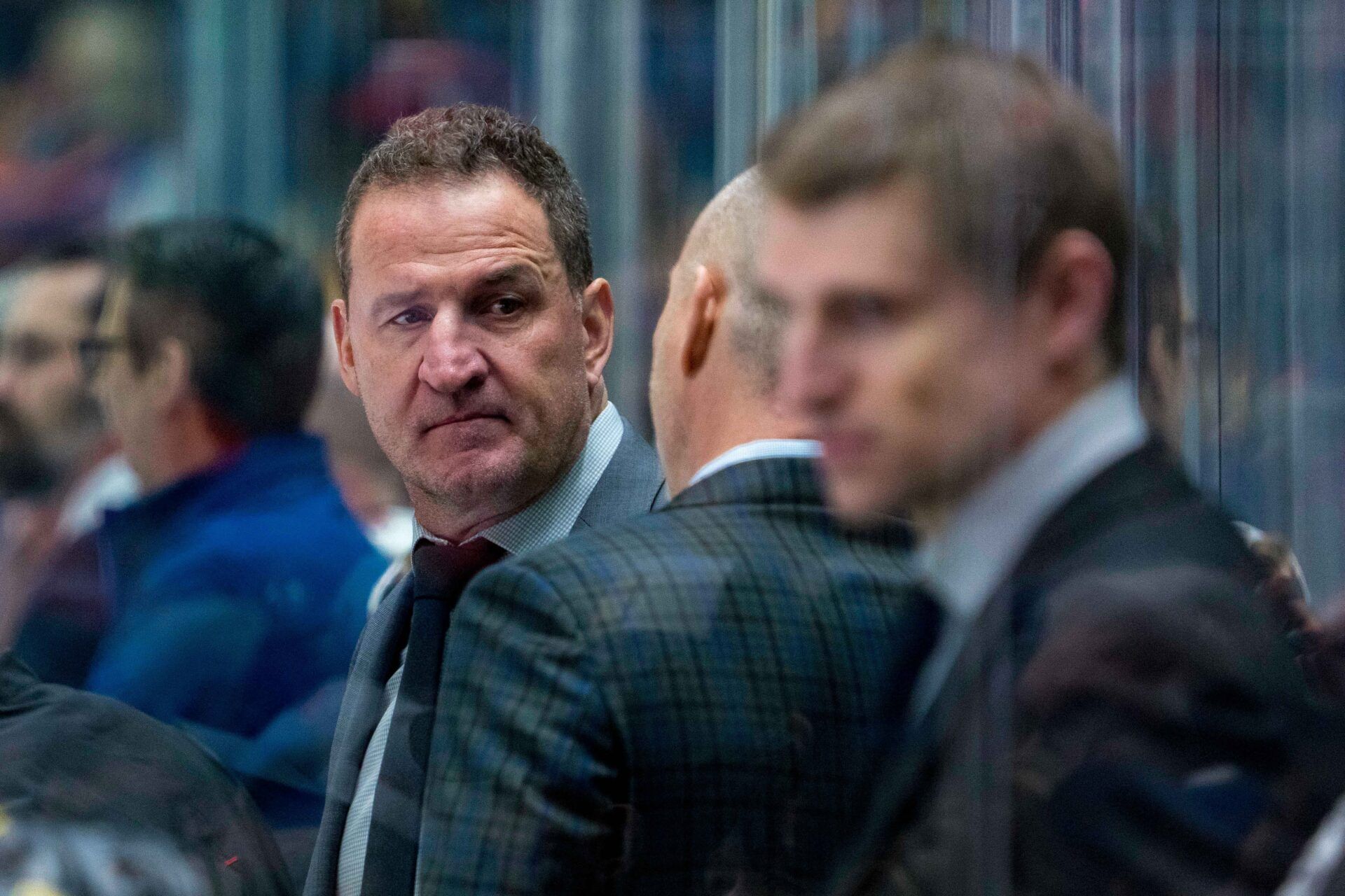 Vancouver Canucks assistant coach Adam Foote on the bench against the Edmonton Oilers in the second period at Rogers Arena.