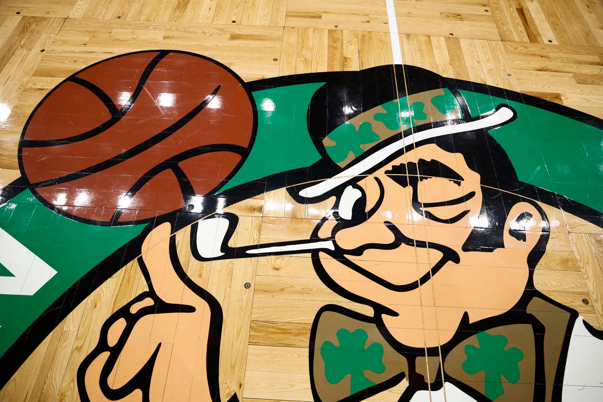 The Boston Celtics logo is seen on the court before the game between the Boston Celtics and the Portland Trail Blazers at TD Garden.