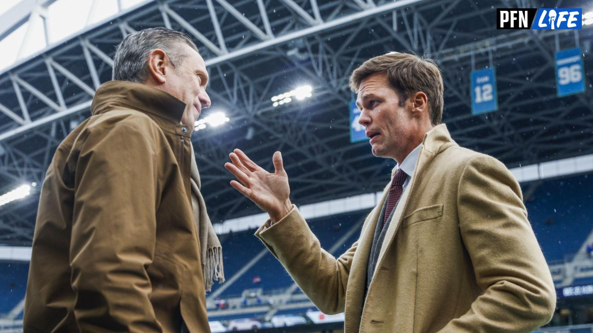 Former New England Patriots quarterbacks Drew Bledsoe, left, and Tom Brady, right, talk during pregame warmups between the Seattle Seahawks and Buffalo Bills at Lumen Field.