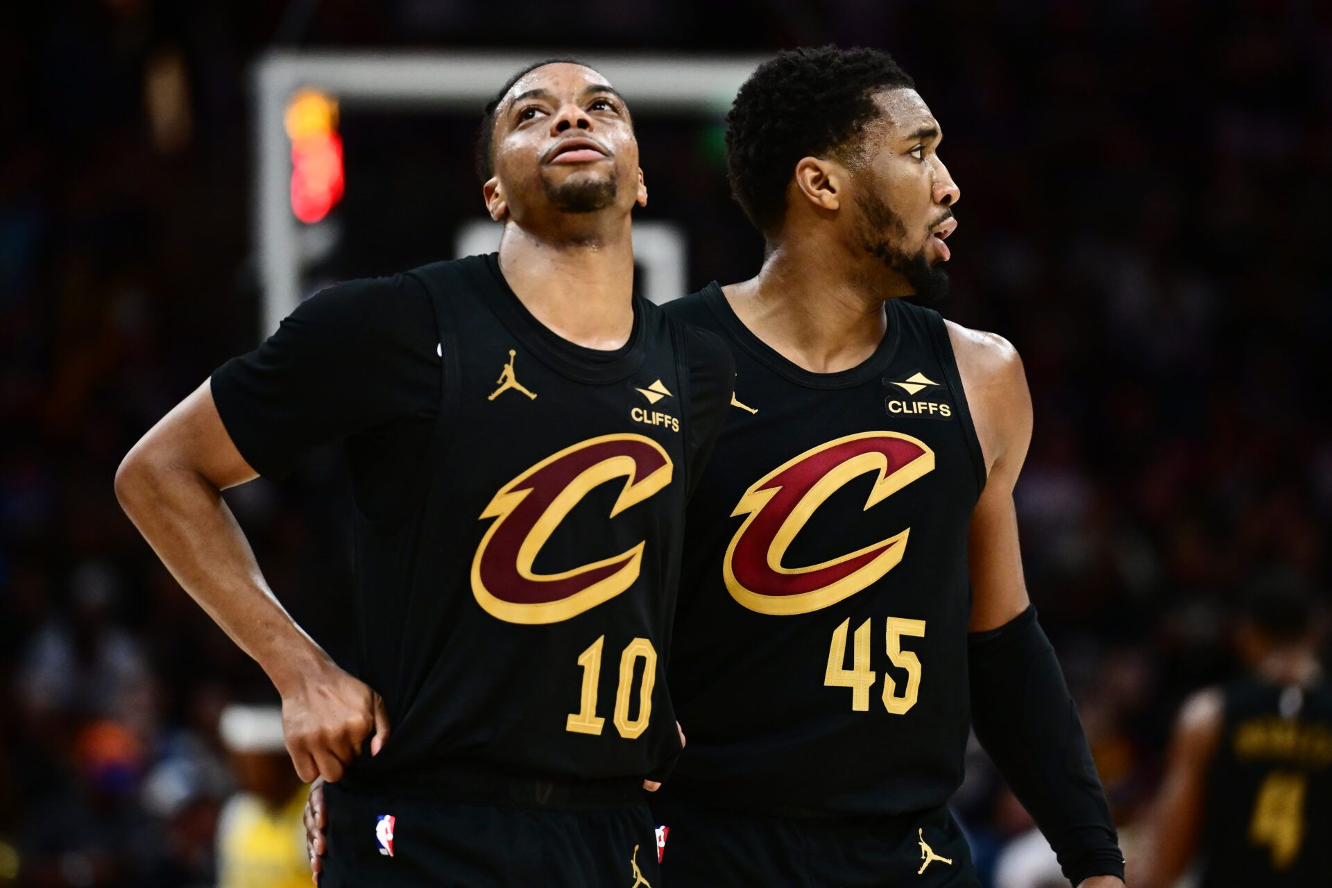Cleveland Cavaliers guard Darius Garland (10) and guard Donovan Mitchell (45) react during the second half against the Indiana Pacers in game five of the second round for the 2025 NBA Playoffs at Rocket Arena.